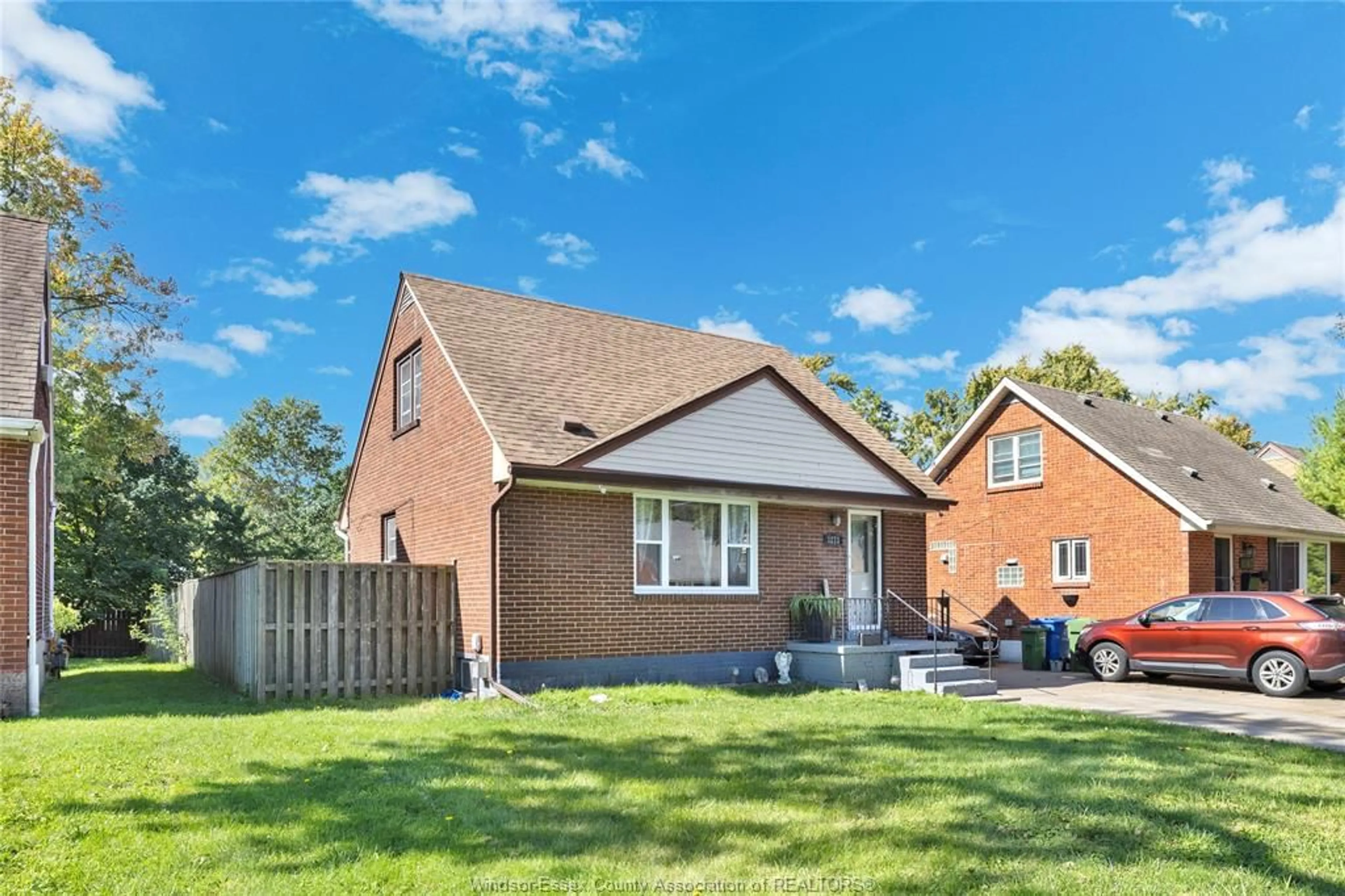 Home with brick exterior material, street for 1273 TILSTON Dr, Windsor Ontario N9B 3C6