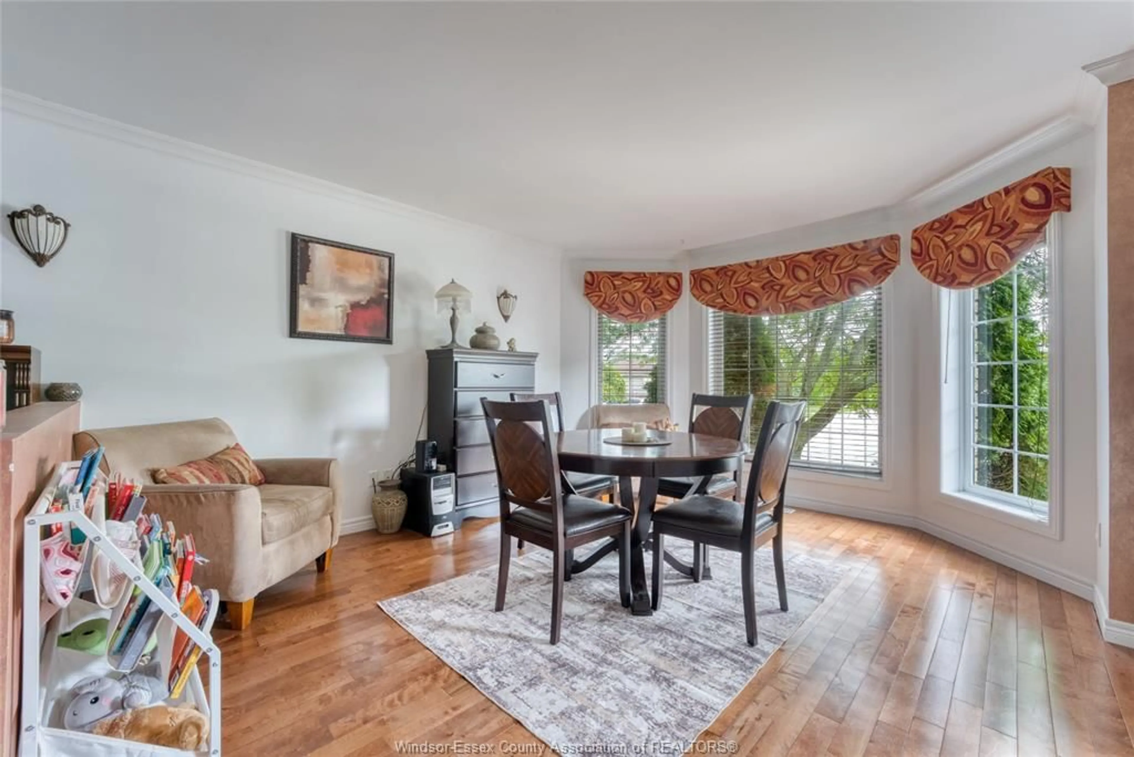 Dining room, wood/laminate floor for 1610 Chornoby Cres, Tecumseh Ontario N8N 4W3