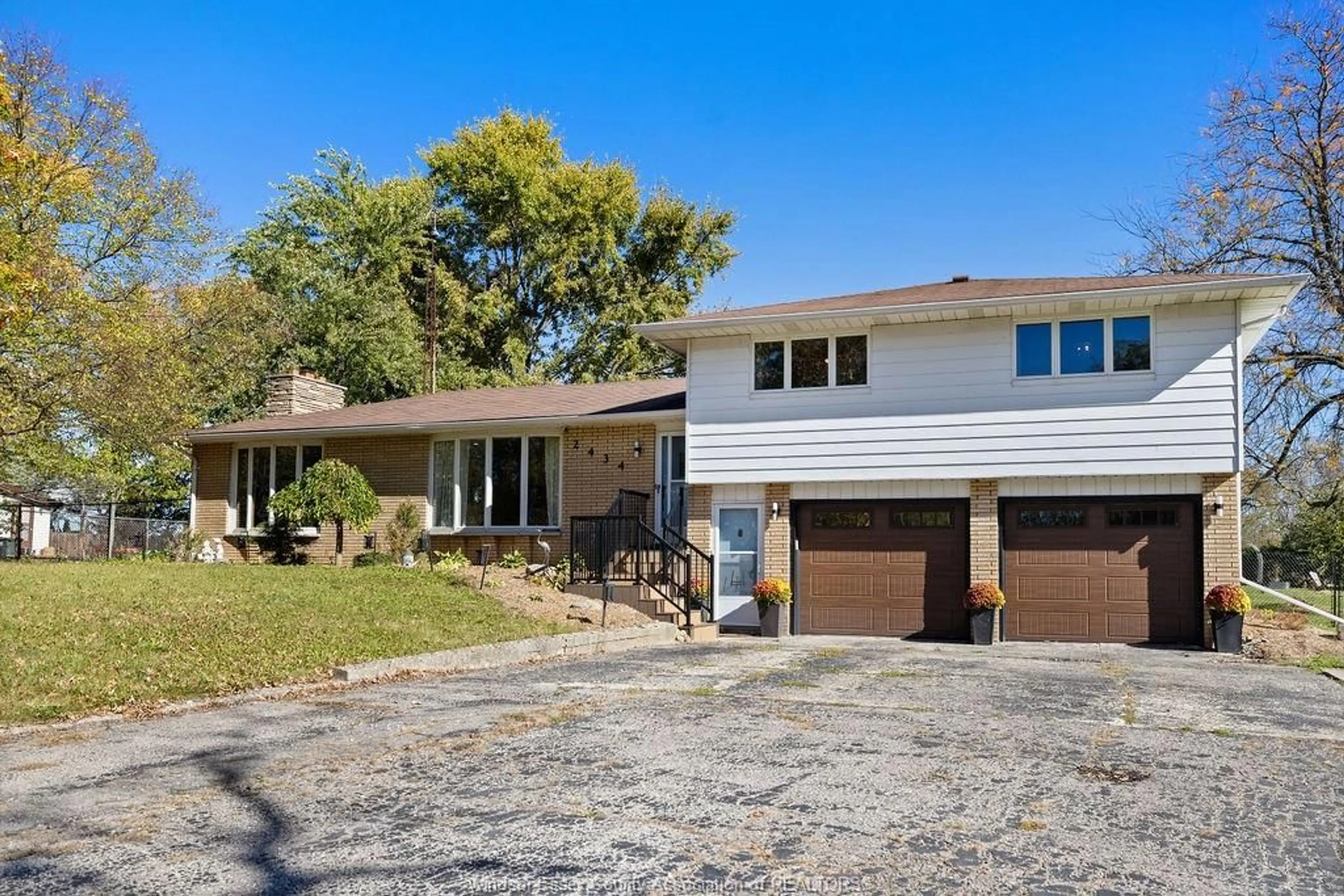 Home with brick exterior material, street for 2434 COUNTY RD 27, Lakeshore Ontario N0R 1V0
