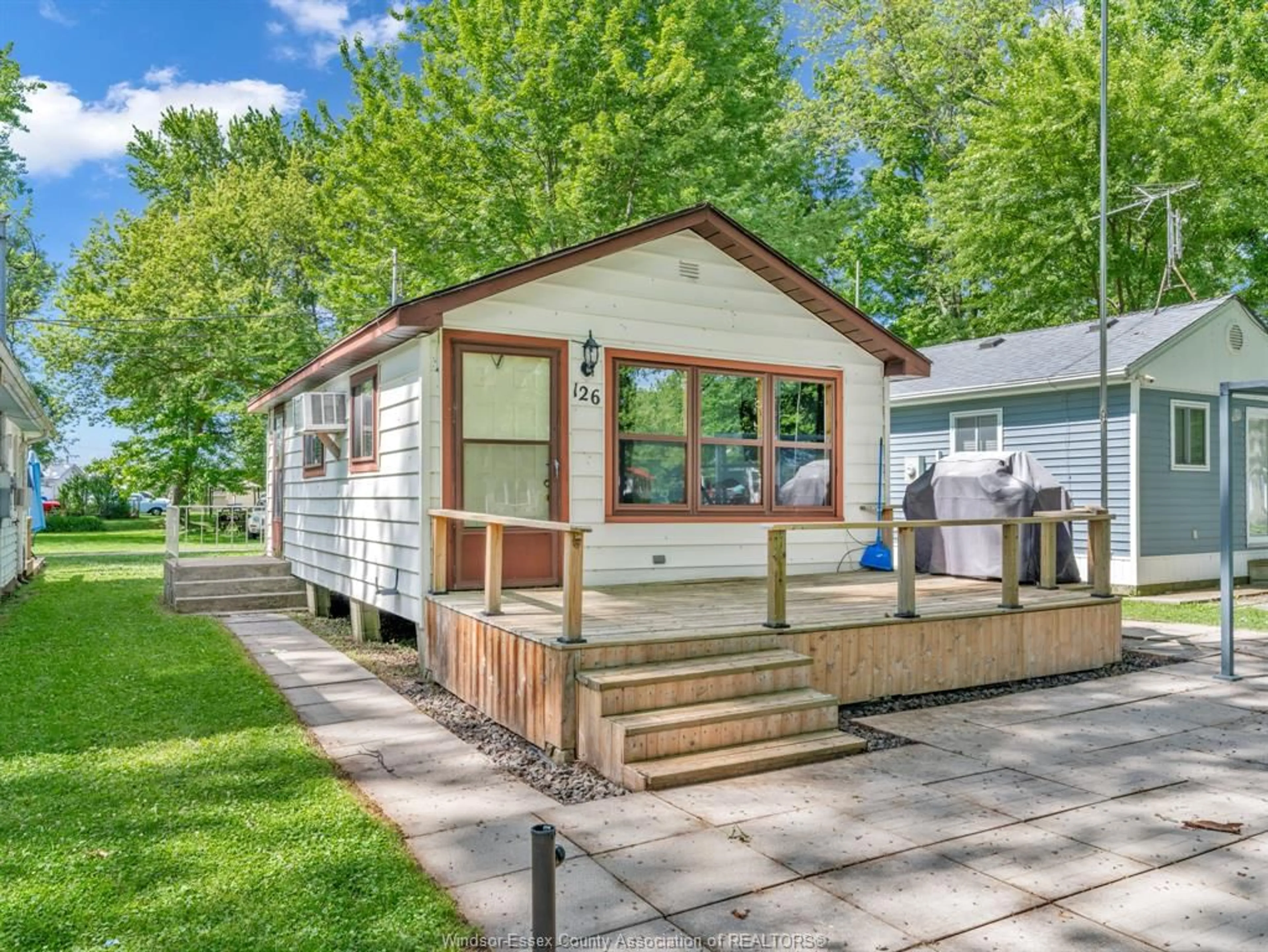 Home with vinyl exterior material, street for 126 PLEASURE BEACH, Harrow Ontario N0R 1G0
