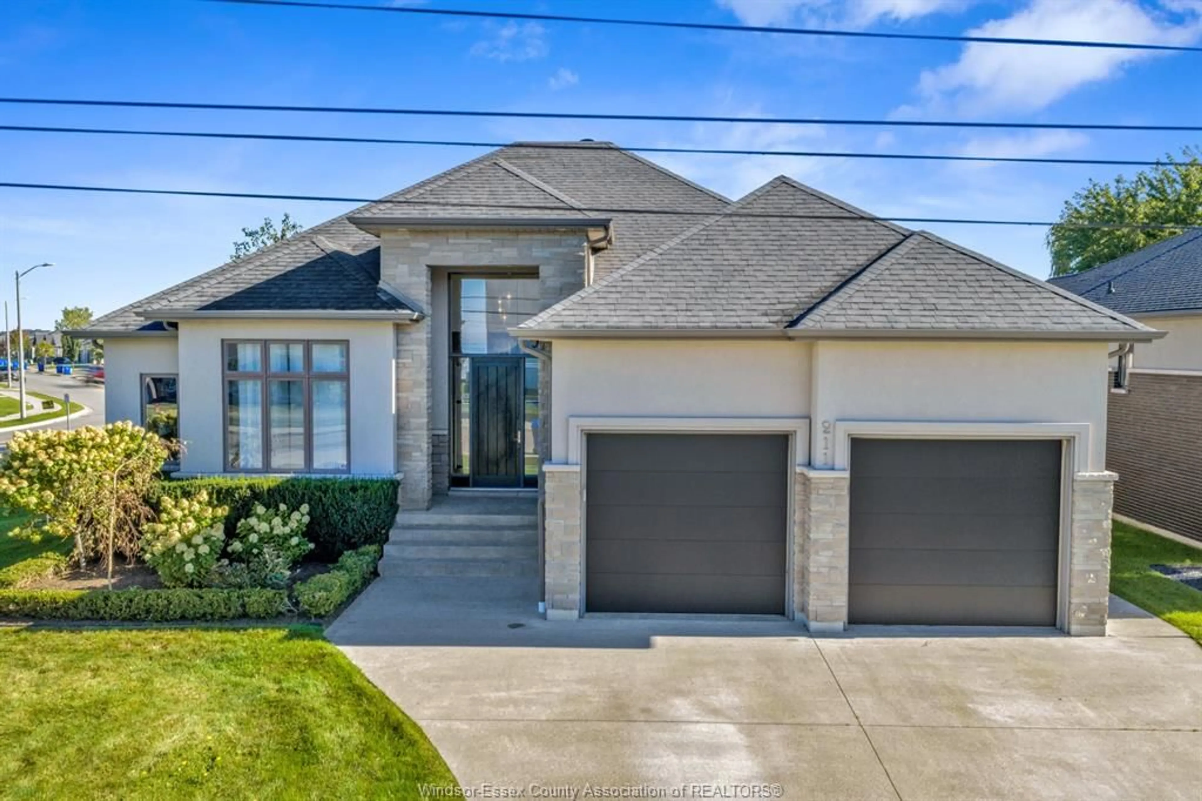 Home with brick exterior material, street for 211 ROBSON Rd, Leamington Ontario N8H 5R2