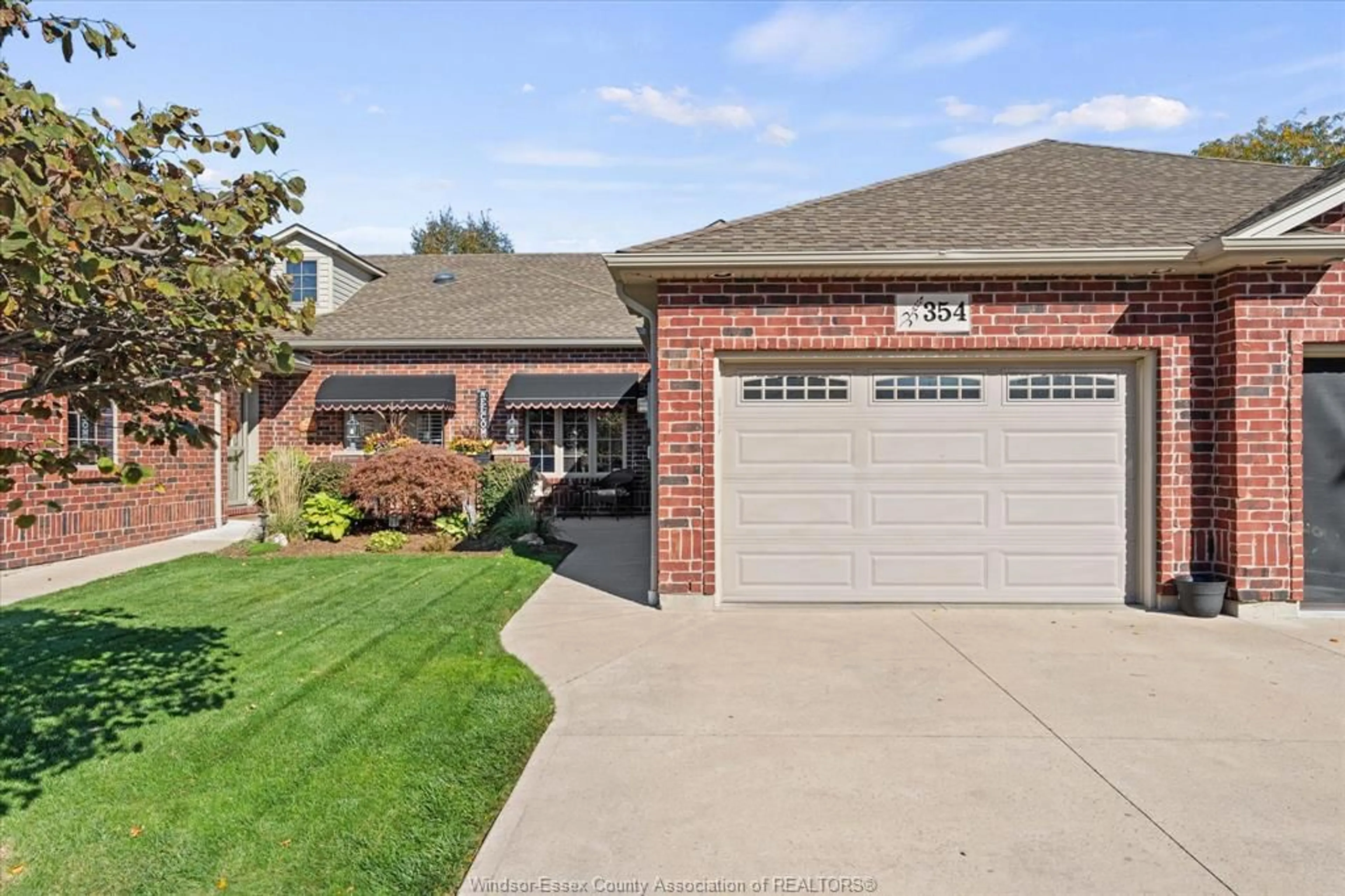 Home with brick exterior material, street for 354 COOPER Cres, Belle River Ontario N8L 0P5