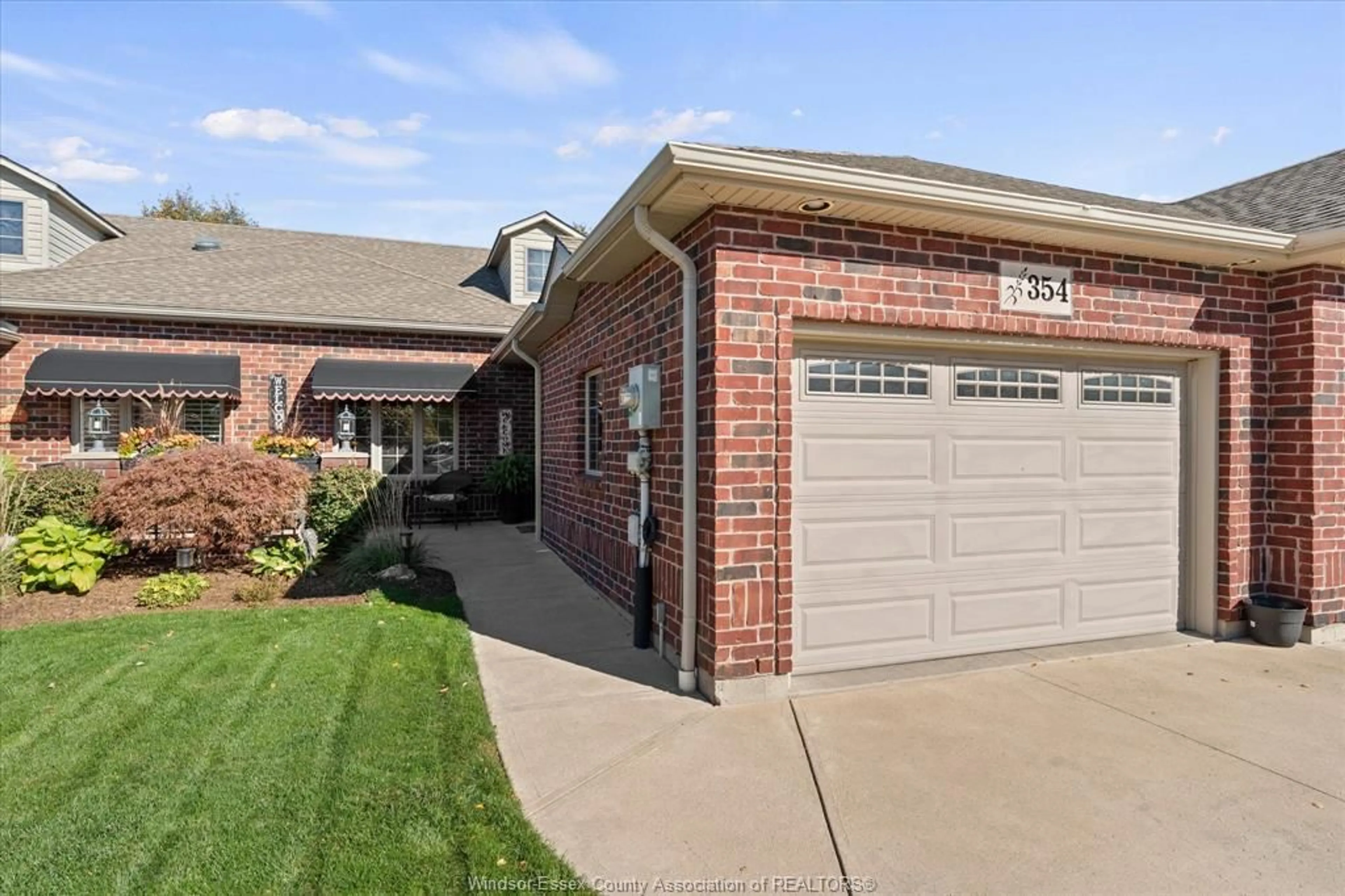 Home with brick exterior material, street for 354 COOPER Cres, Belle River Ontario N8L 0P5