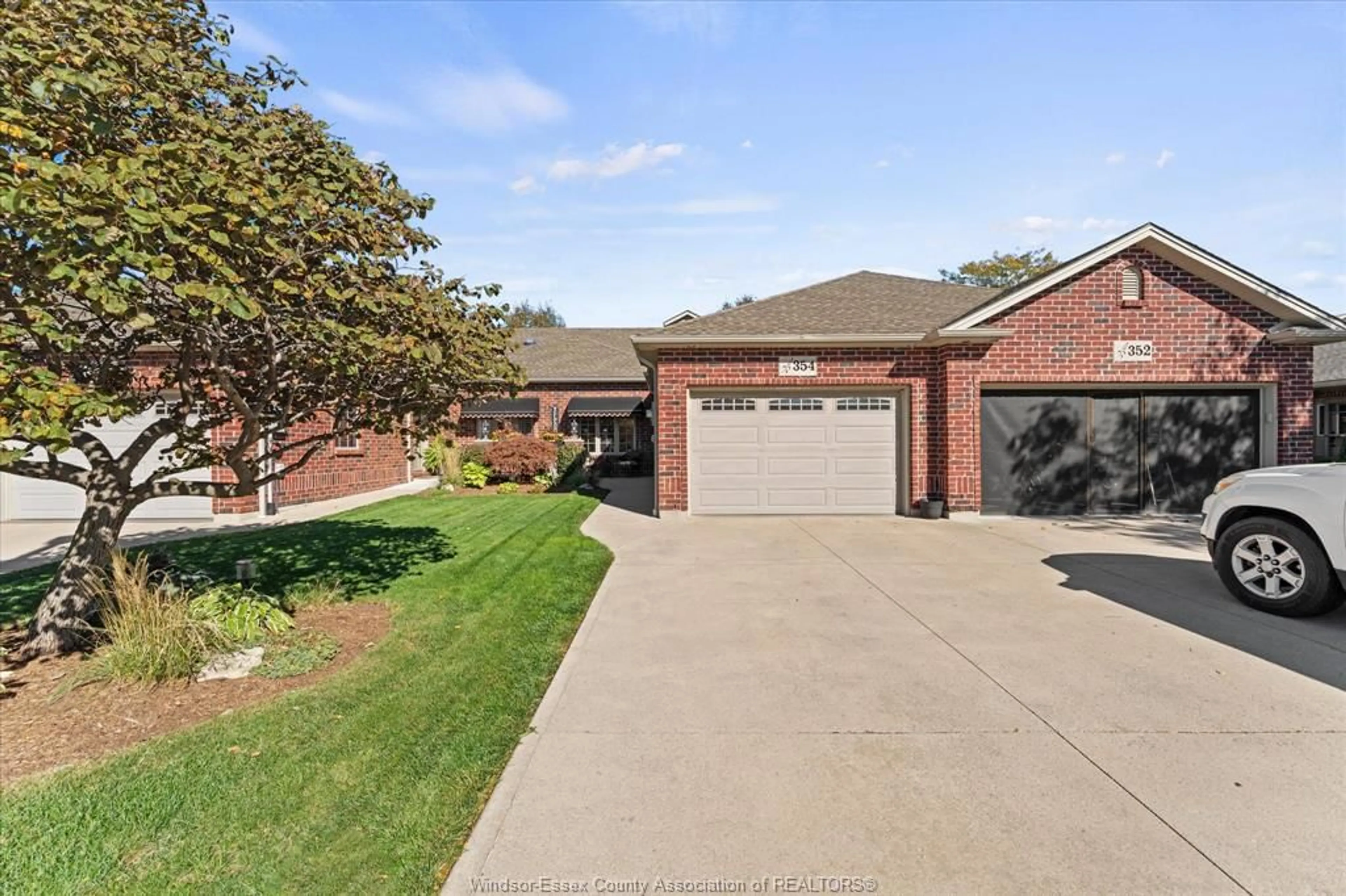 Home with brick exterior material, street for 354 COOPER Cres, Belle River Ontario N8L 0P5