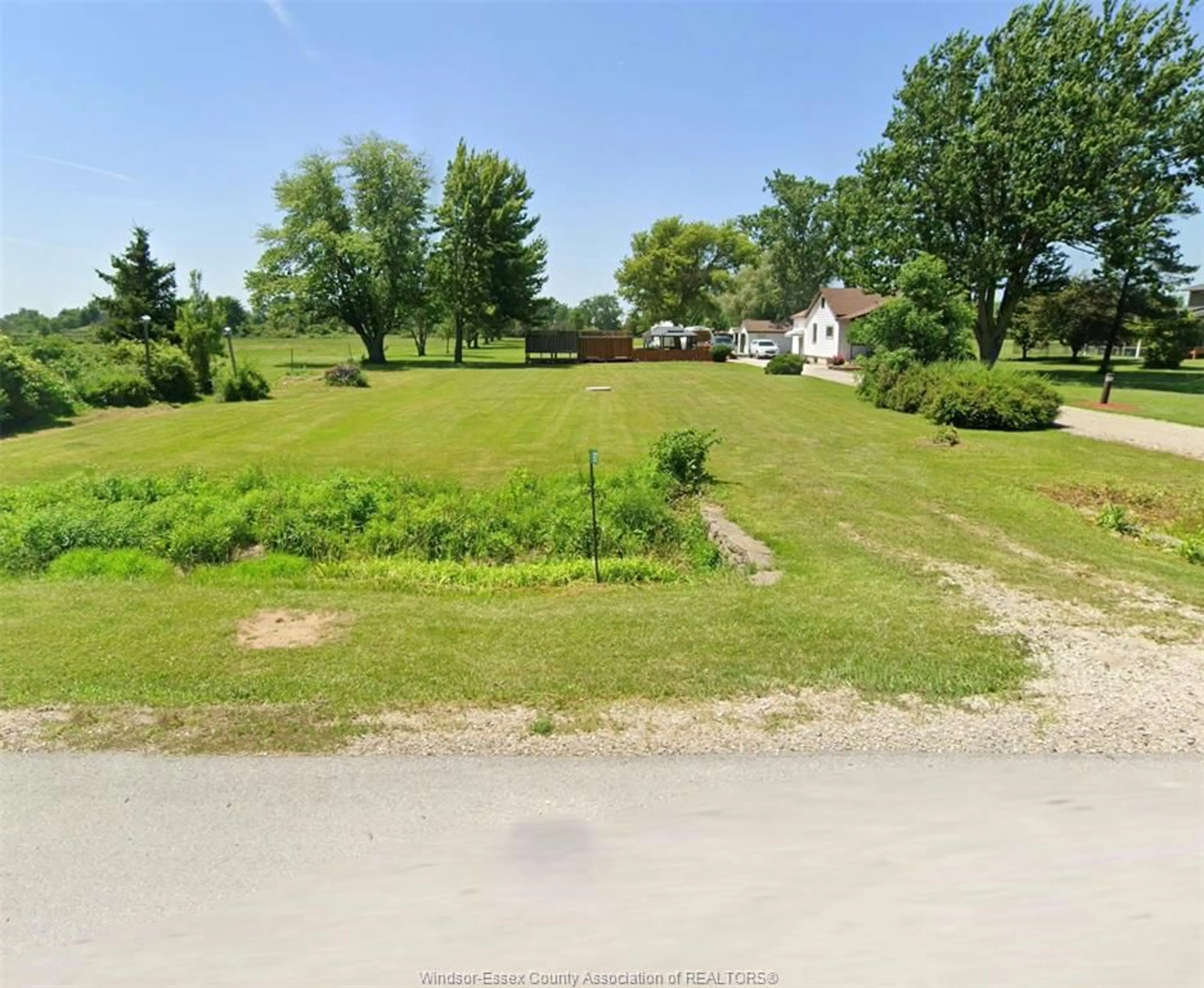 A pic from outside/outdoor area/front of a property/back of a property/a pic from drone, water/lake/river/ocean view for 677 PUCE Rd, Lakeshore Ontario N8M 2X7