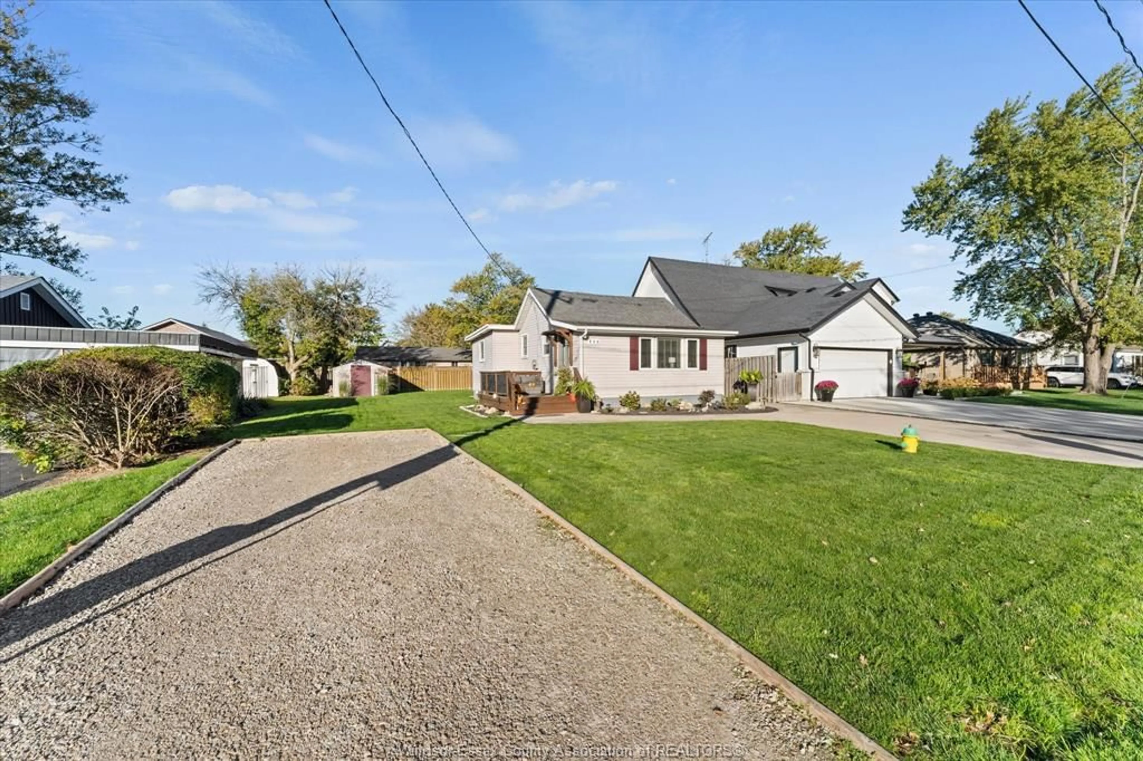 A pic from outside/outdoor area/front of a property/back of a property/a pic from drone, street for 396 WEST BELLE RIVER Rd, Lakeshore Ontario N0R 1A0