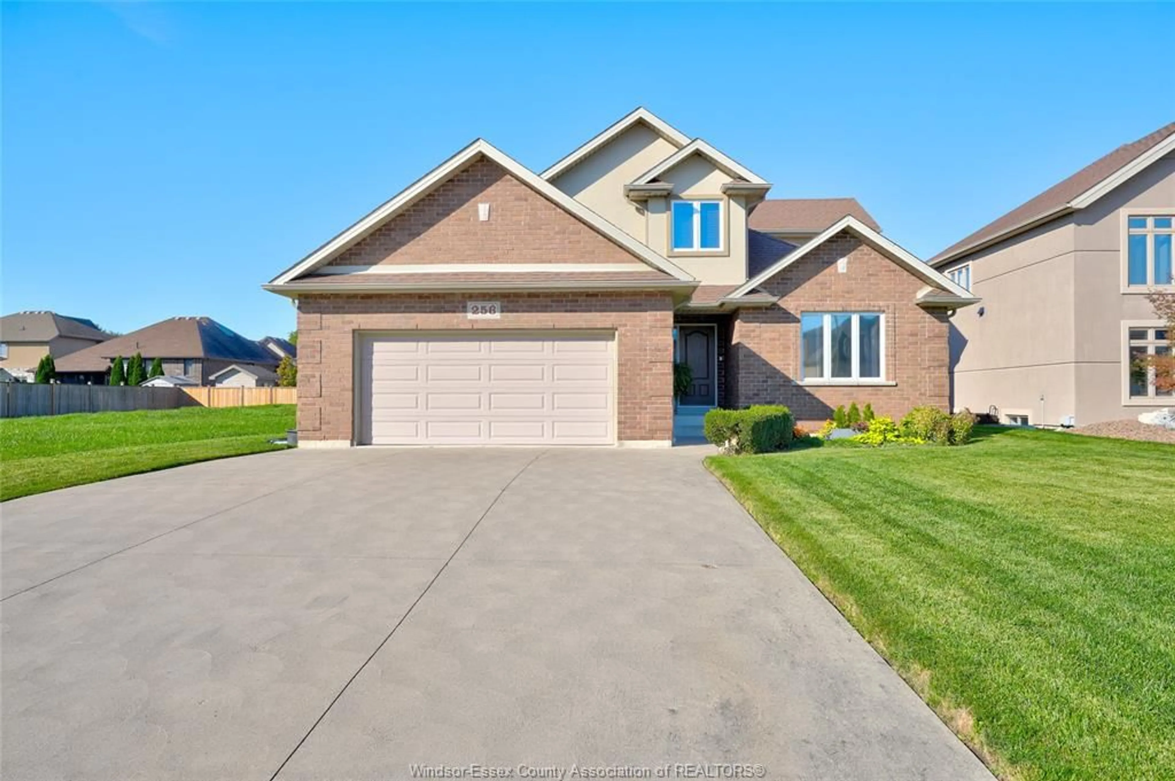 Home with brick exterior material, street for 256 MAXWELL Cres, Lakeshore Ontario N8L 0S9