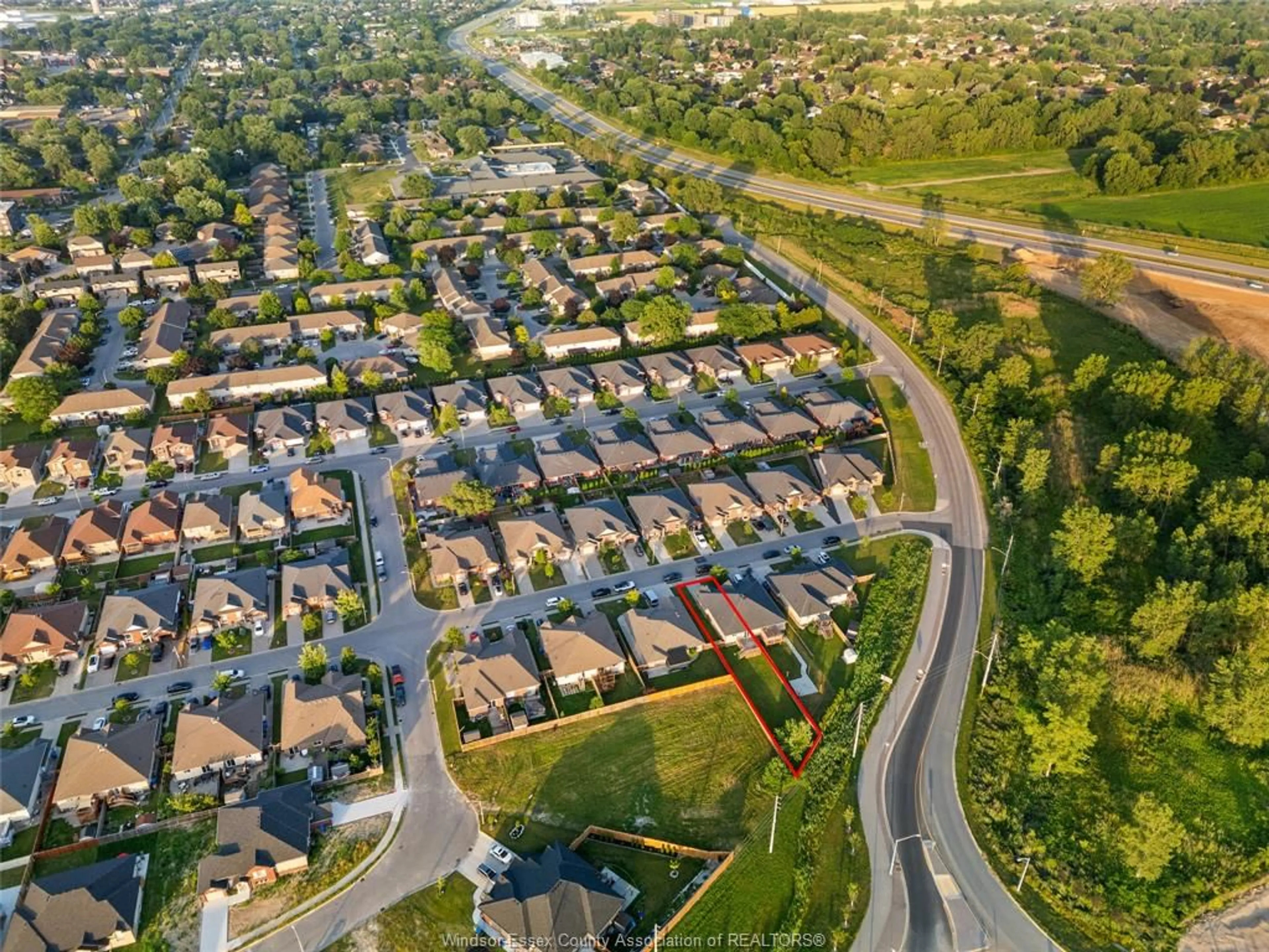 A pic from outside/outdoor area/front of a property/back of a property/a pic from drone, street for 3237 SEVILLE, Windsor Ontario N8M 0A3