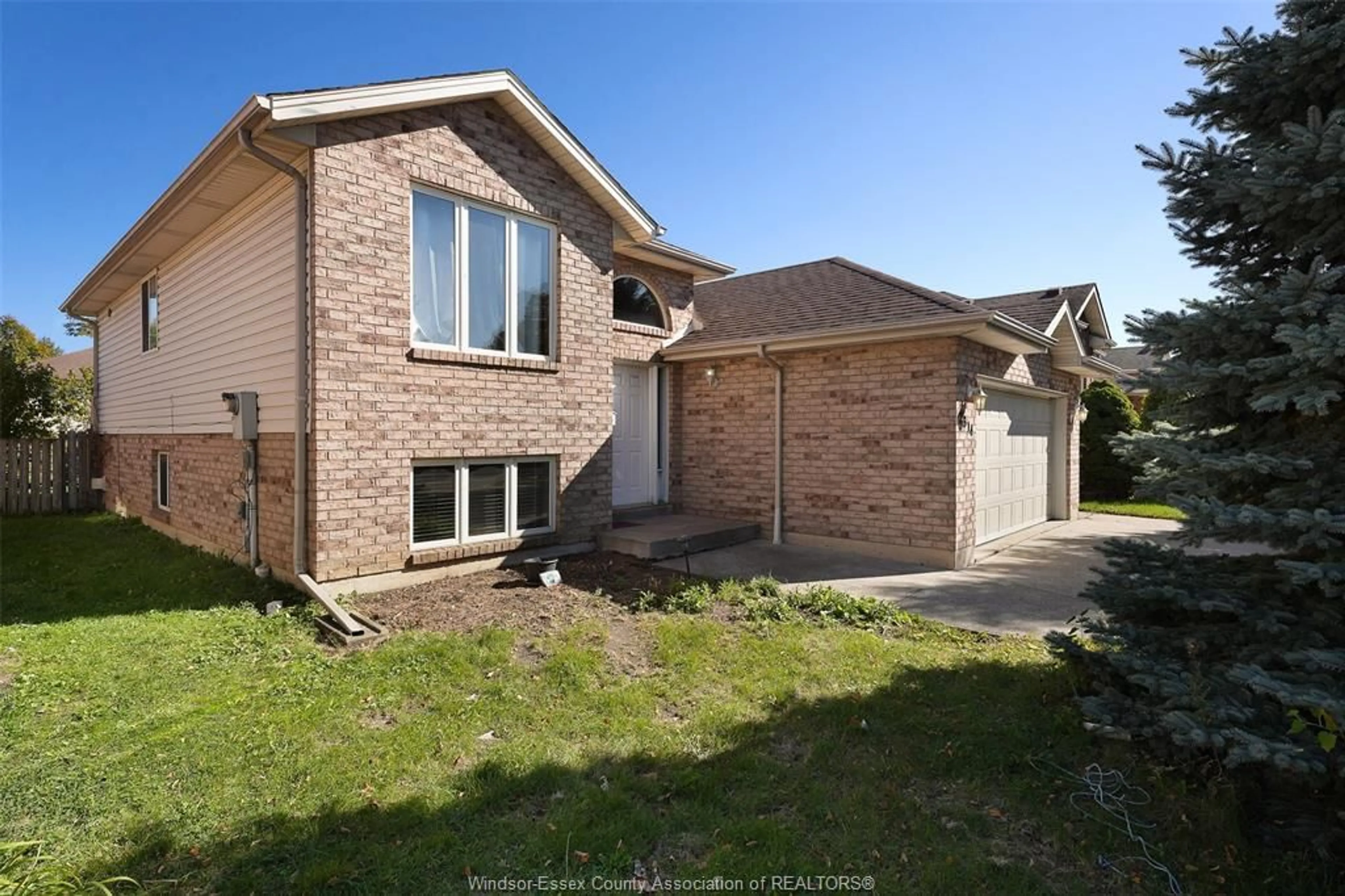 Home with brick exterior material, street for 2314 ST CLAIR Ave, Windsor Ontario N9E 4S7