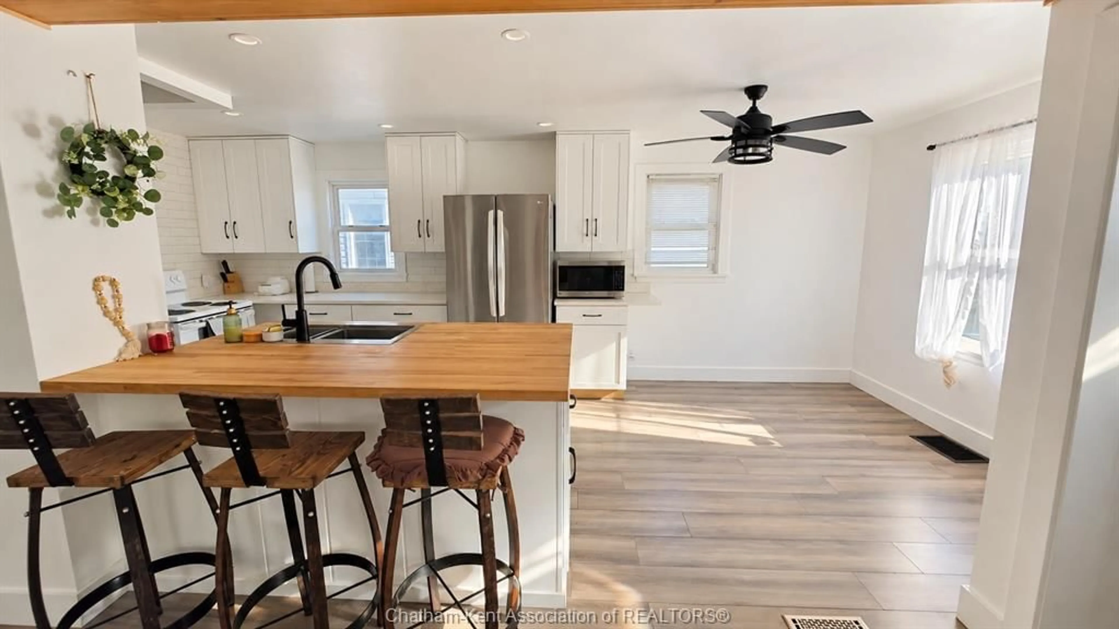 Open concept kitchen, wood/laminate floor for 95 Poplar St, Chatham Ontario N7L 1K2