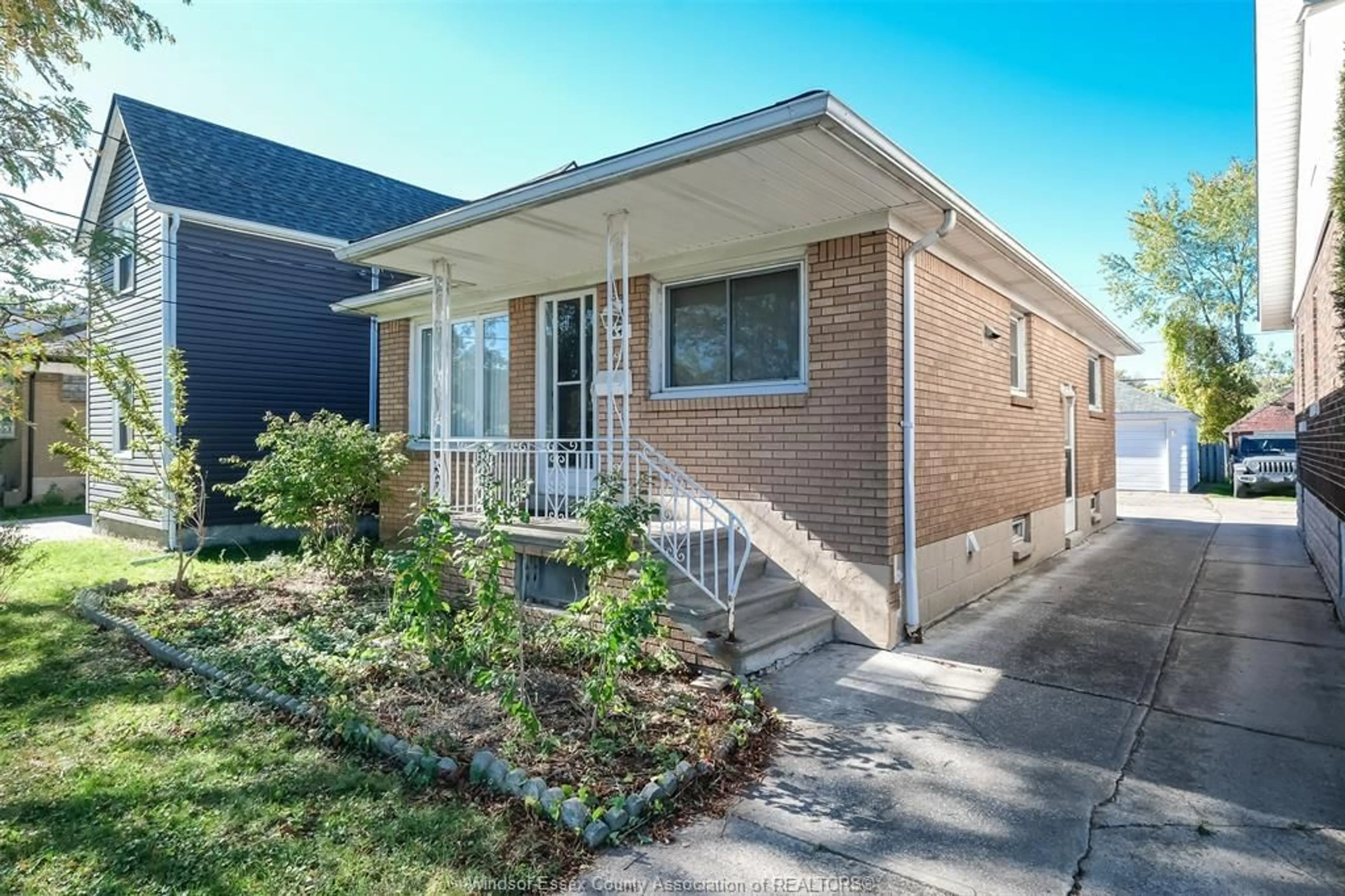 Home with brick exterior material, street for 1647 BENJAMIN, Windsor Ontario N8X 4N7