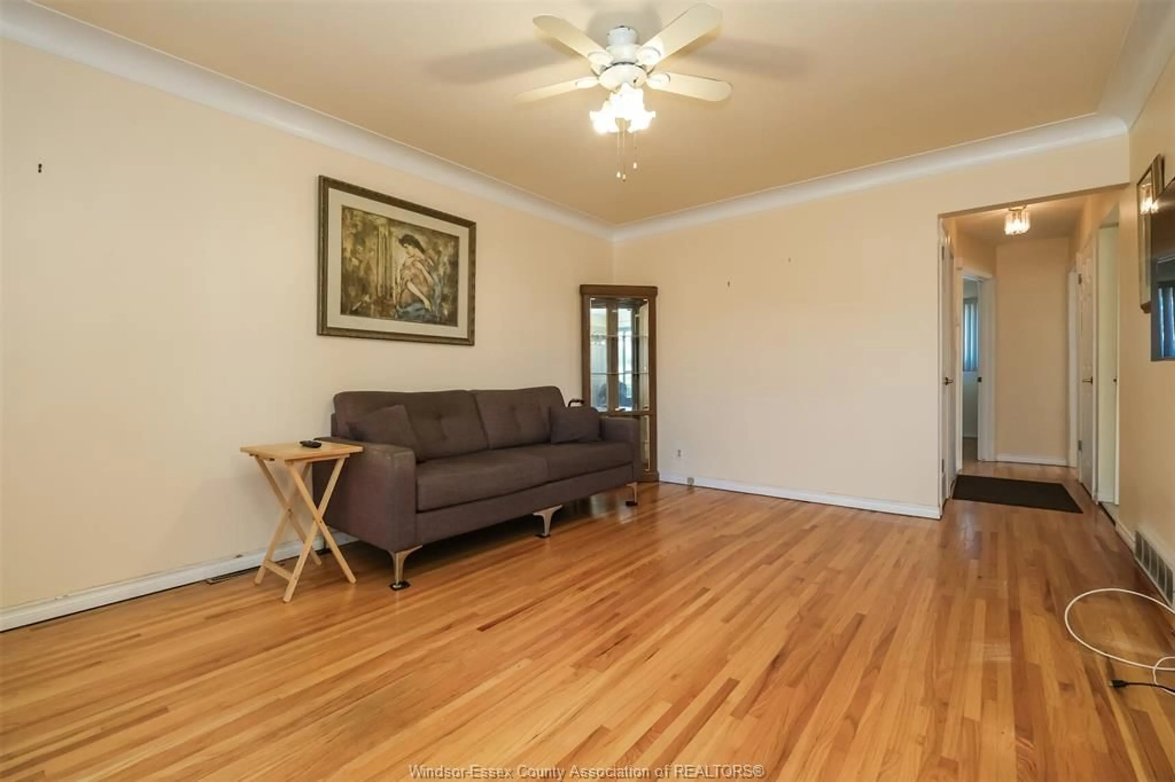 Living room with furniture, wood/laminate floor for 1647 BENJAMIN, Windsor Ontario N8X 4N7