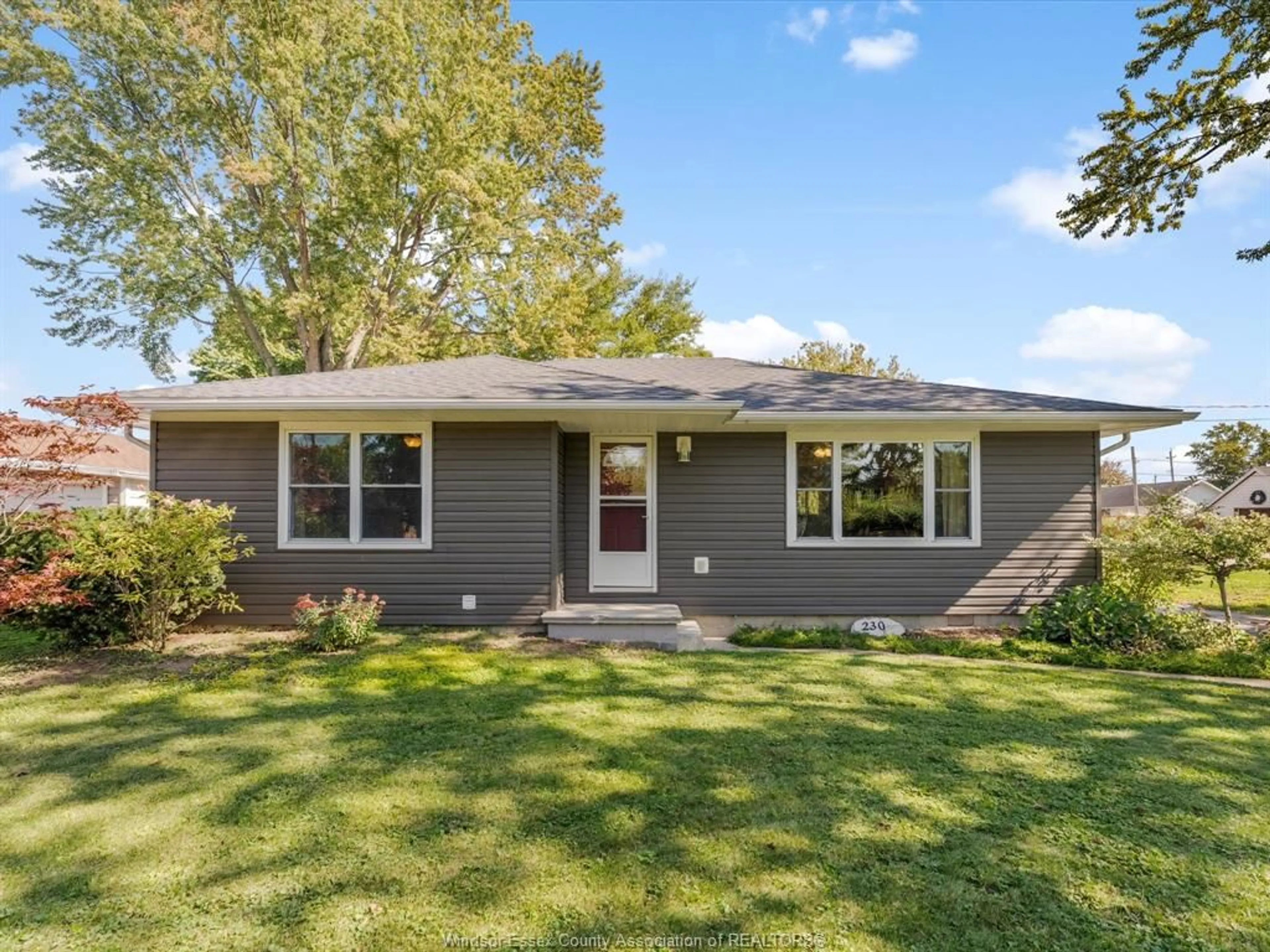 Home with vinyl exterior material, street for 230 CARUHEL, Lakeshore Ontario N0R 1A0