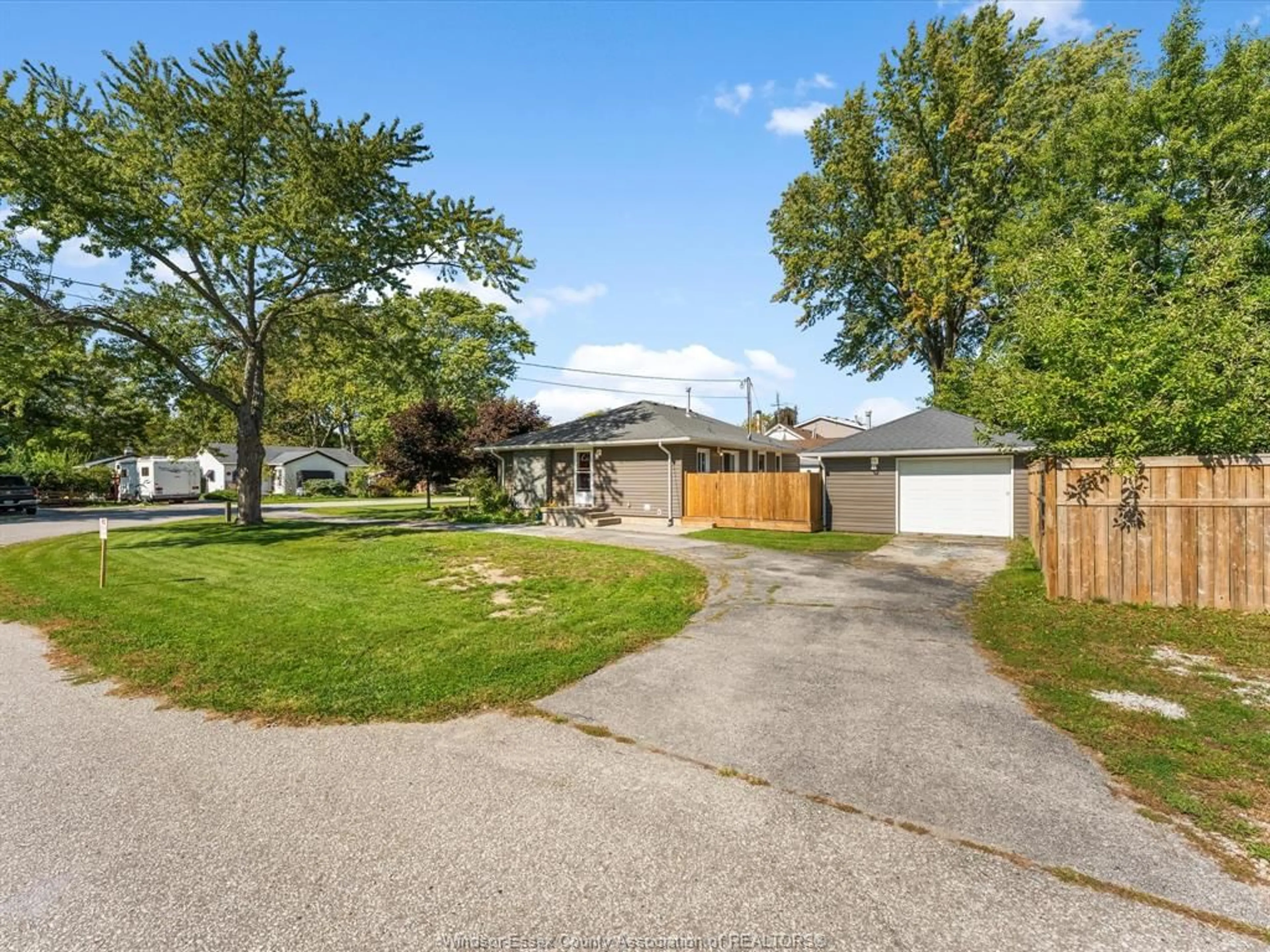 A pic from outside/outdoor area/front of a property/back of a property/a pic from drone, street for 230 CARUHEL, Lakeshore Ontario N0R 1A0