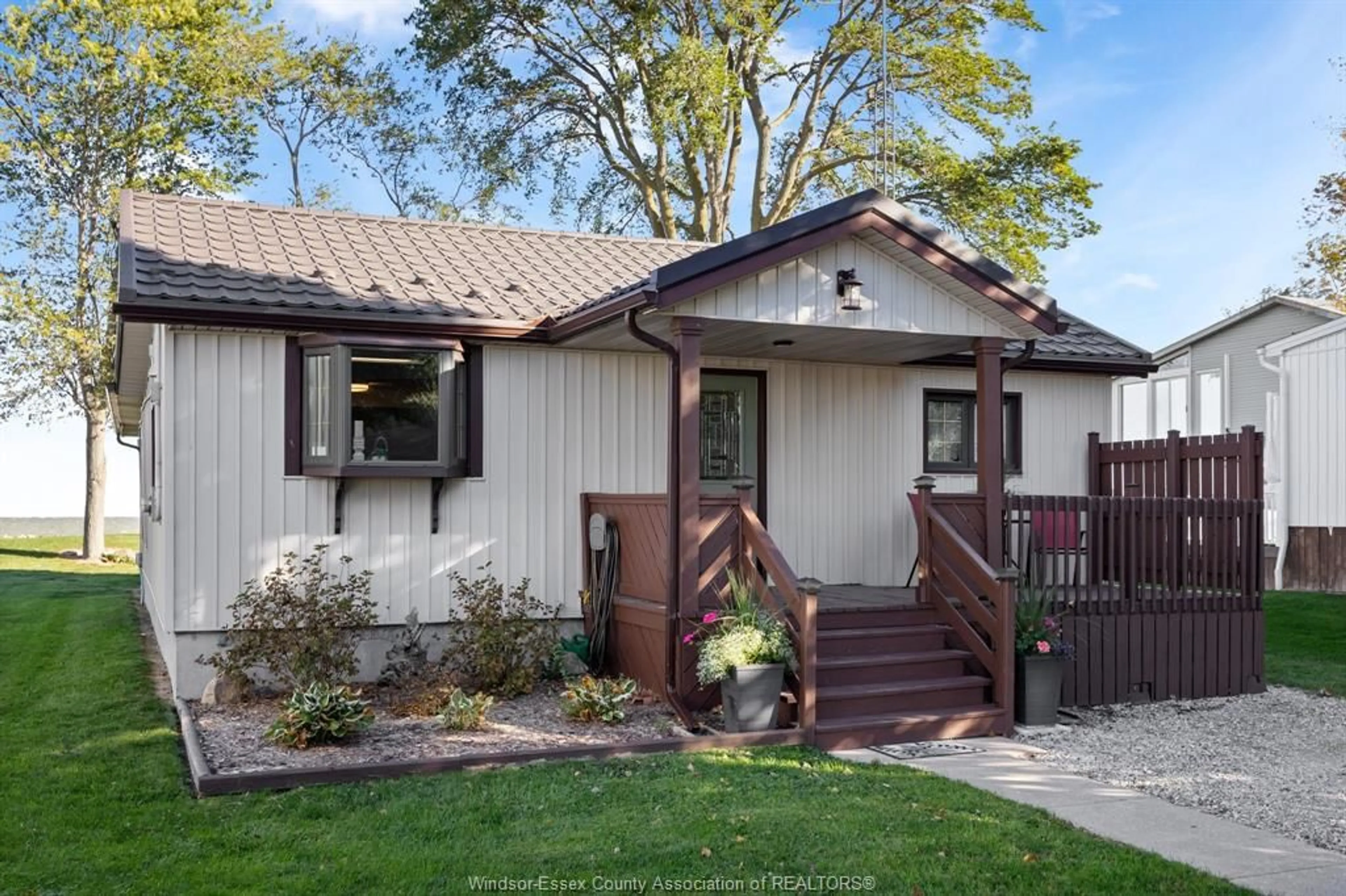 Home with vinyl exterior material, street for 10780 ST. CLAIR Rd, Lakeshore Ontario N0R 1A0