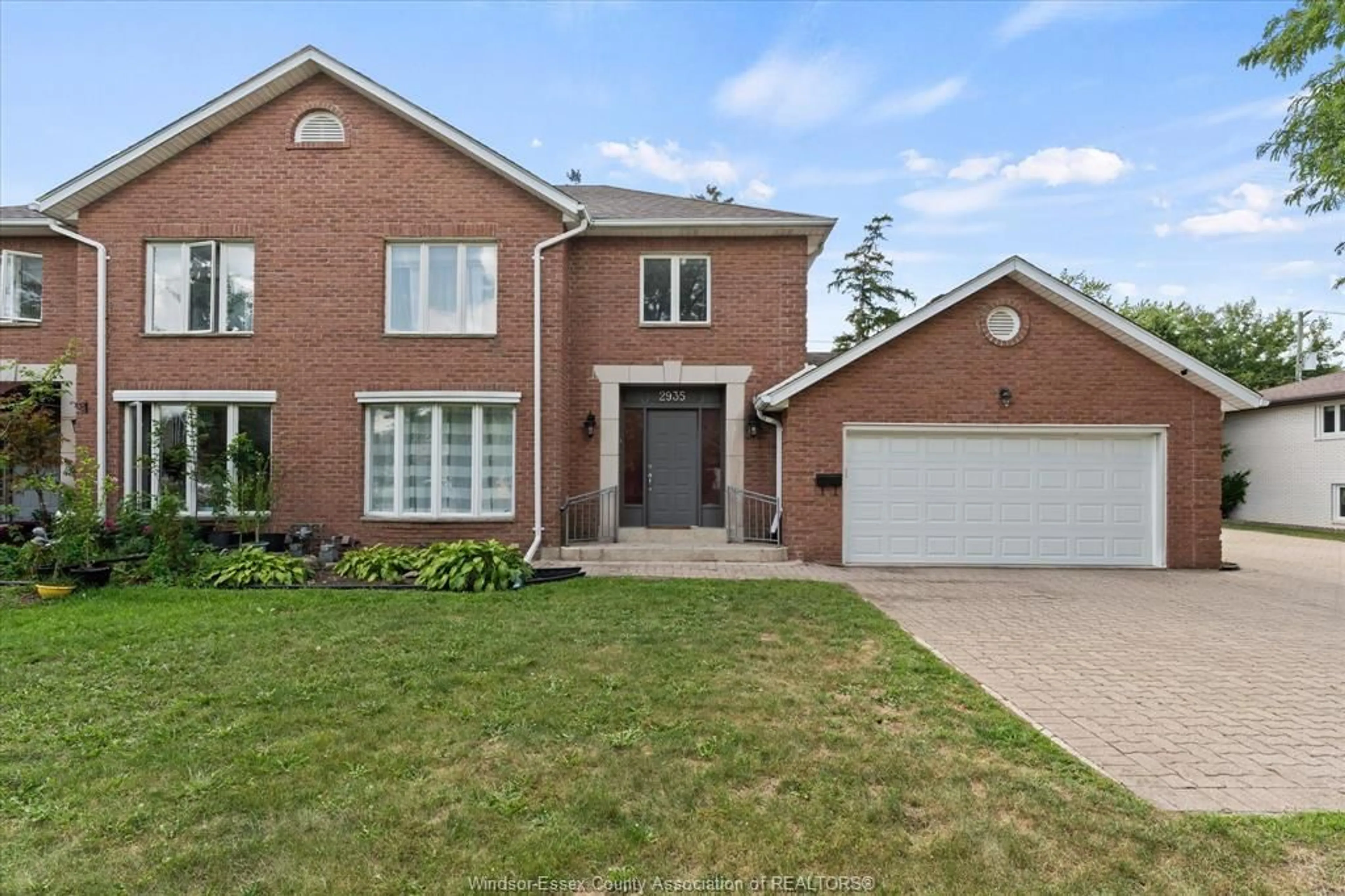 Home with brick exterior material, street for 2935 MCKAY Ave, Windsor Ontario N9E 2R1