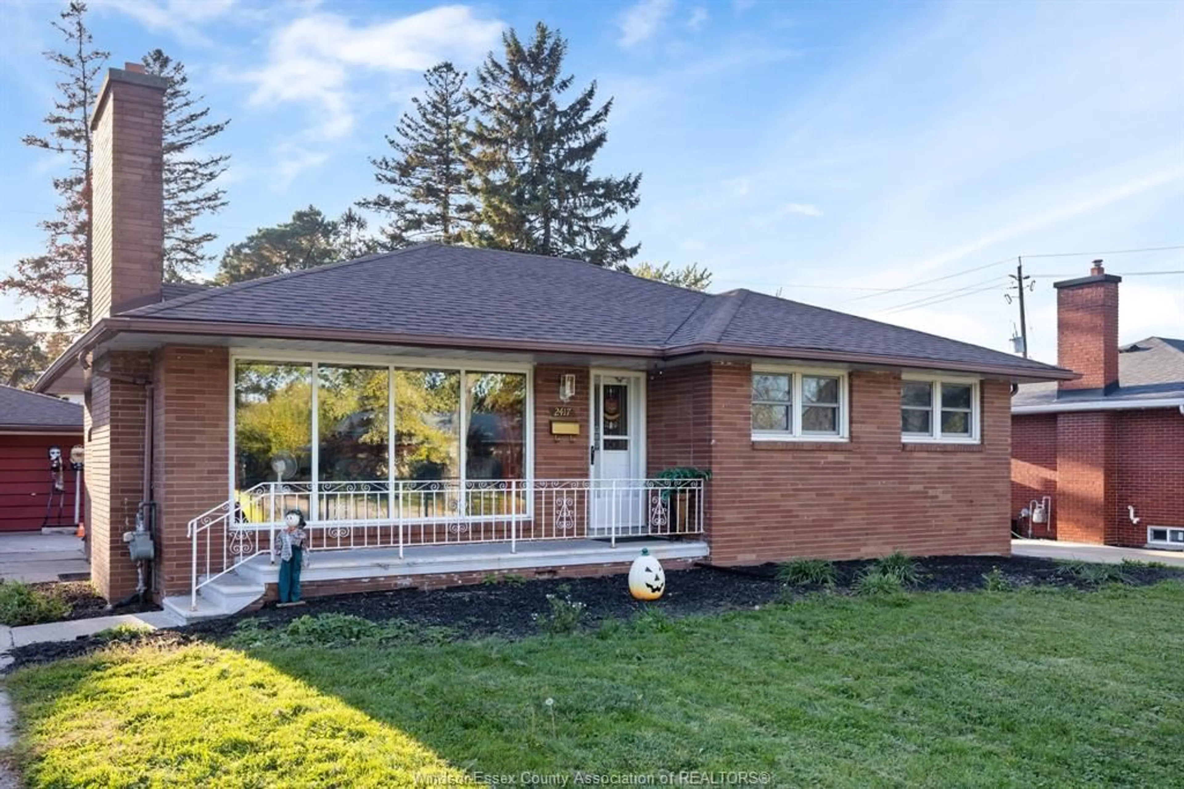 Home with brick exterior material, street for 2417 DANDURAND, Windsor Ontario N9E 2E1