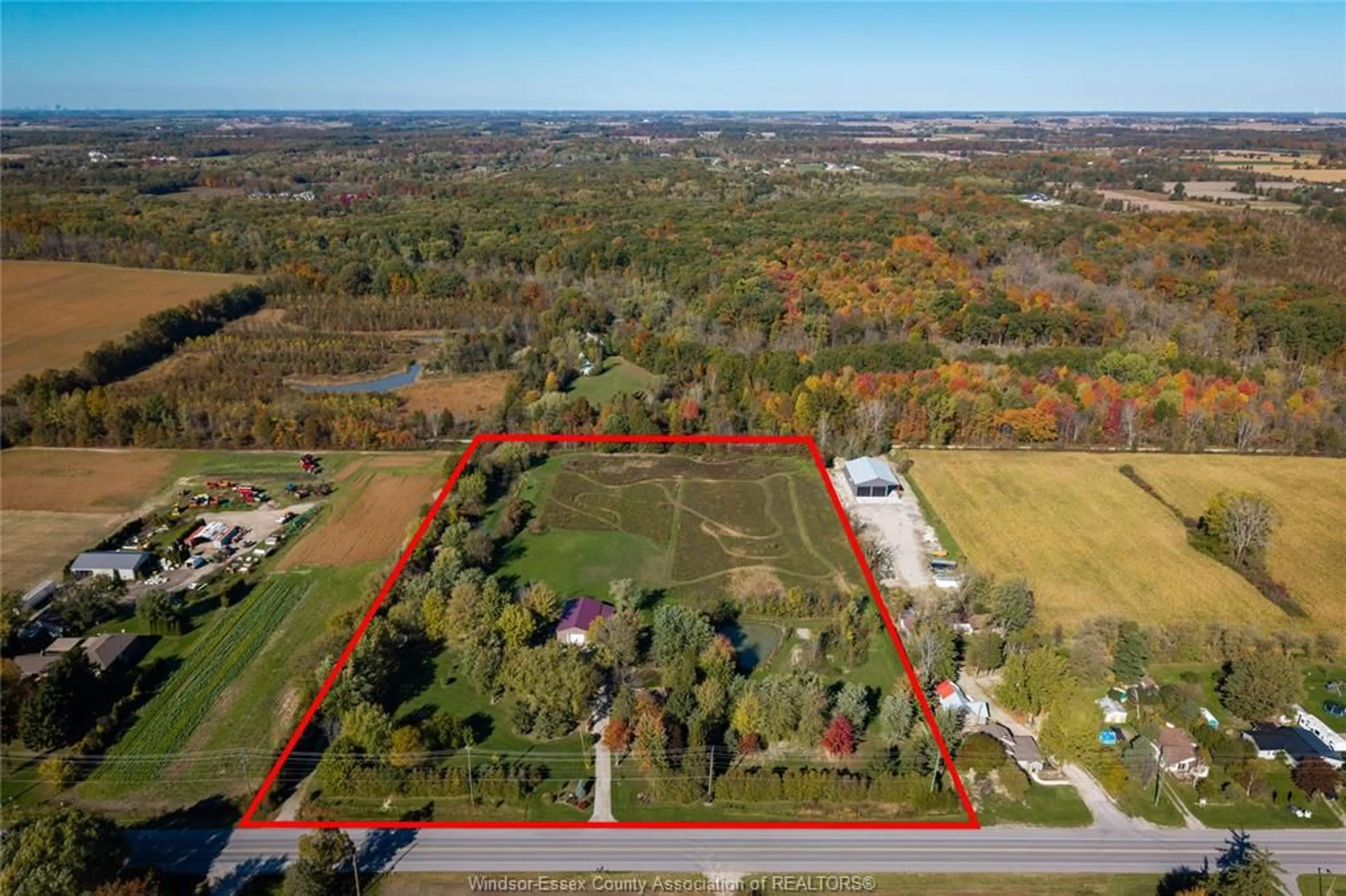 A pic from outside/outdoor area/front of a property/back of a property/a pic from drone, unknown for 2890 County Road 20, Harrow Ontario N0R 1G0