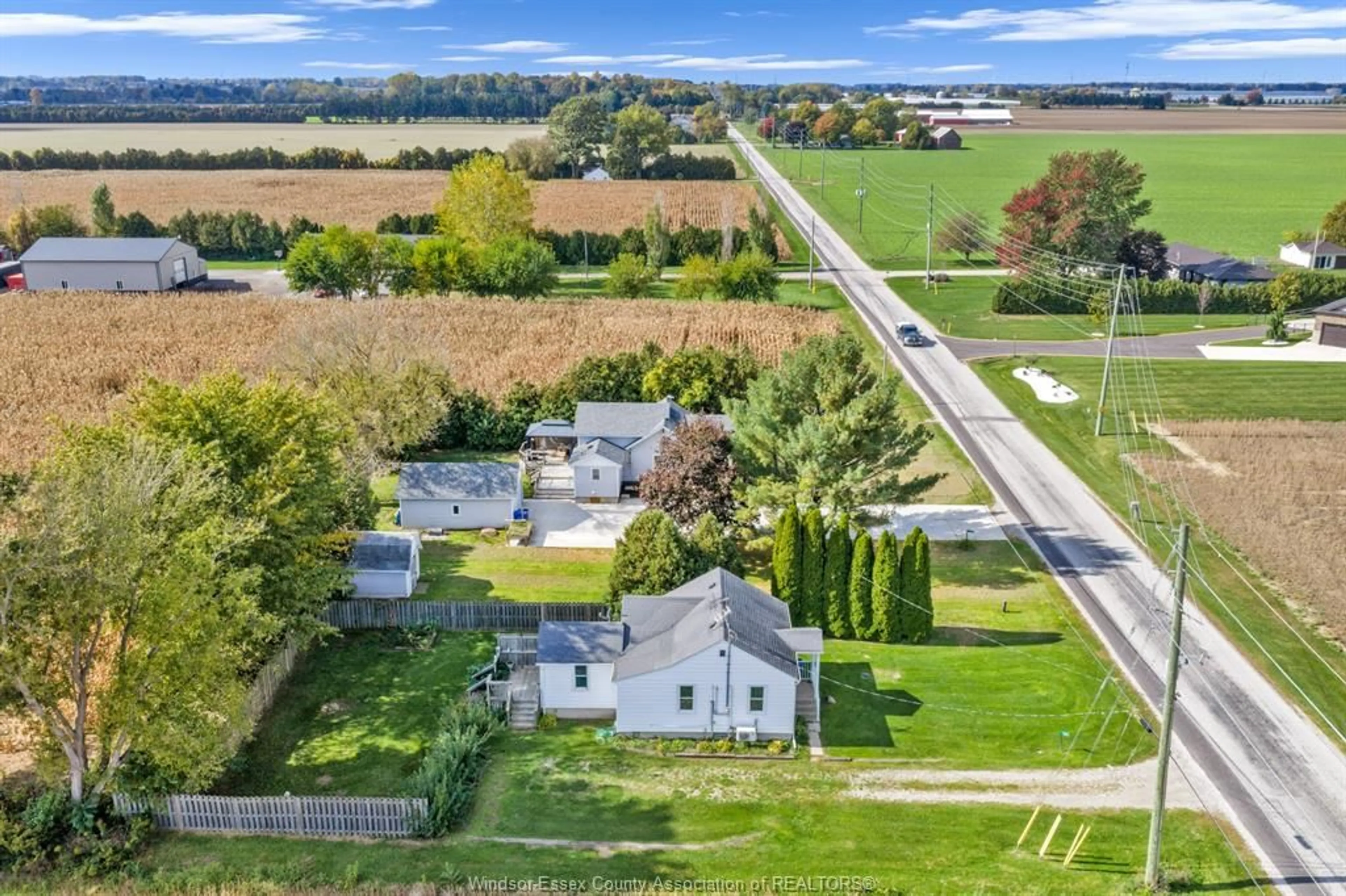 A pic from outside/outdoor area/front of a property/back of a property/a pic from drone, water/lake/river/ocean view for 920 MERSEA RD 6, Leamington Ontario N8H 3V6