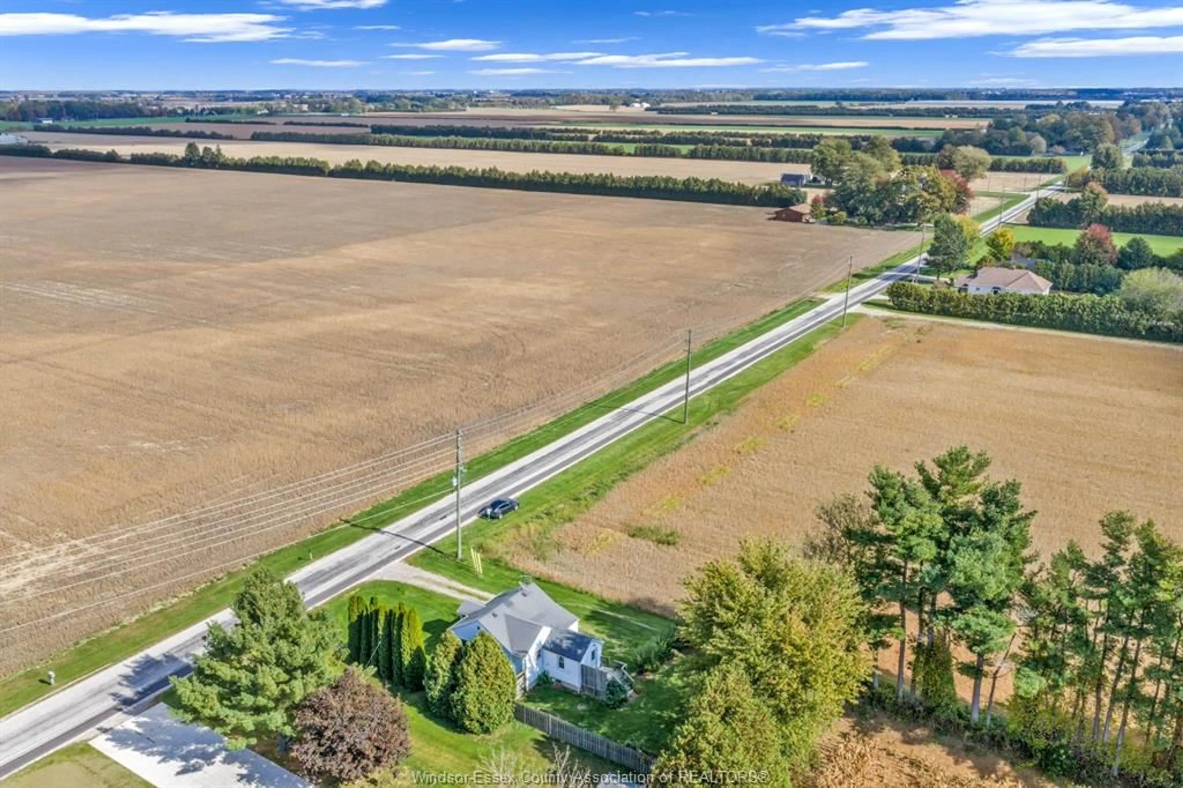 A pic from outside/outdoor area/front of a property/back of a property/a pic from drone, water/lake/river/ocean view for 920 MERSEA RD 6, Leamington Ontario N8H 3V6
