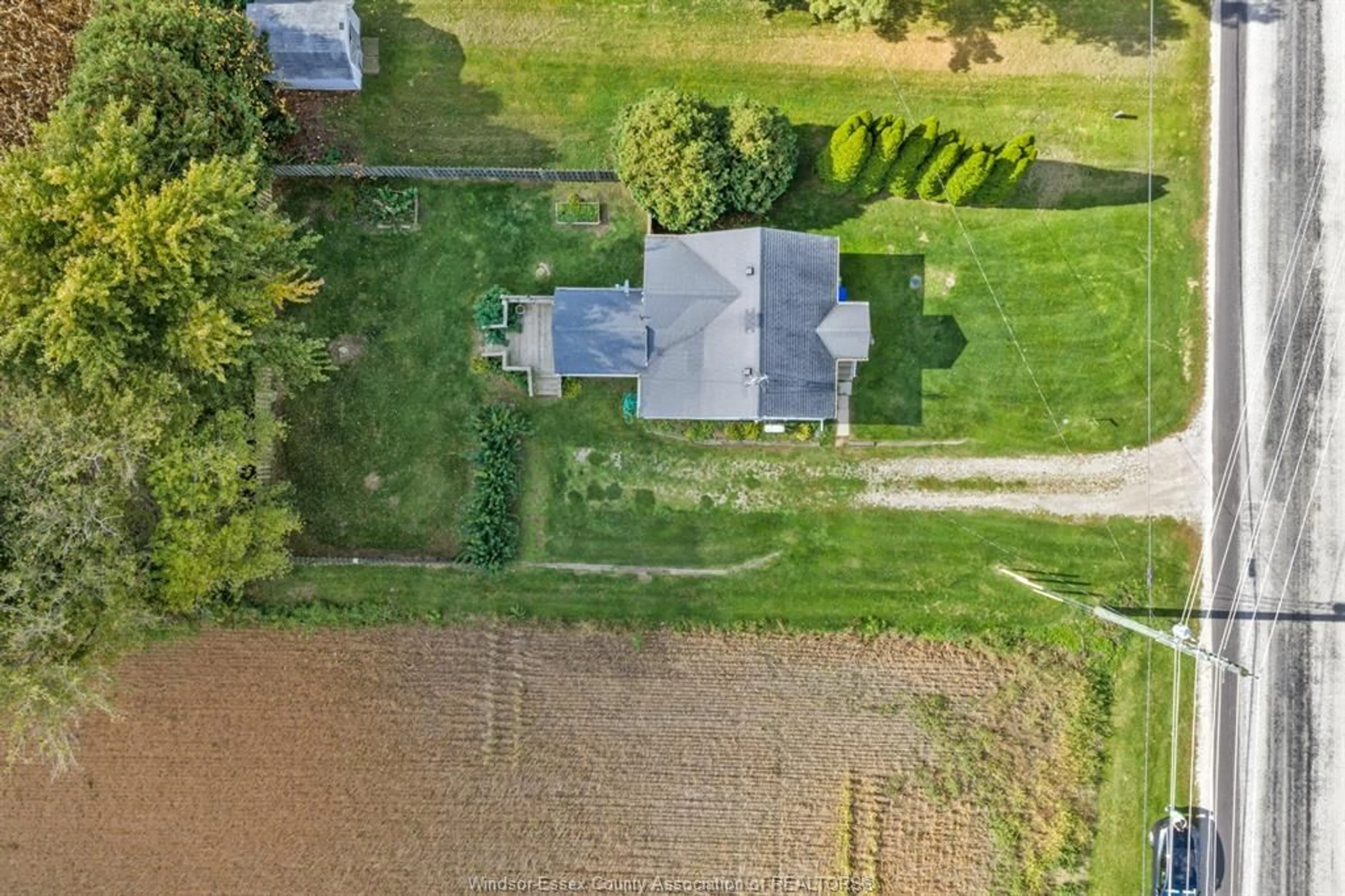 A pic from outside/outdoor area/front of a property/back of a property/a pic from drone, unknown for 920 MERSEA RD 6, Leamington Ontario N8H 3V6