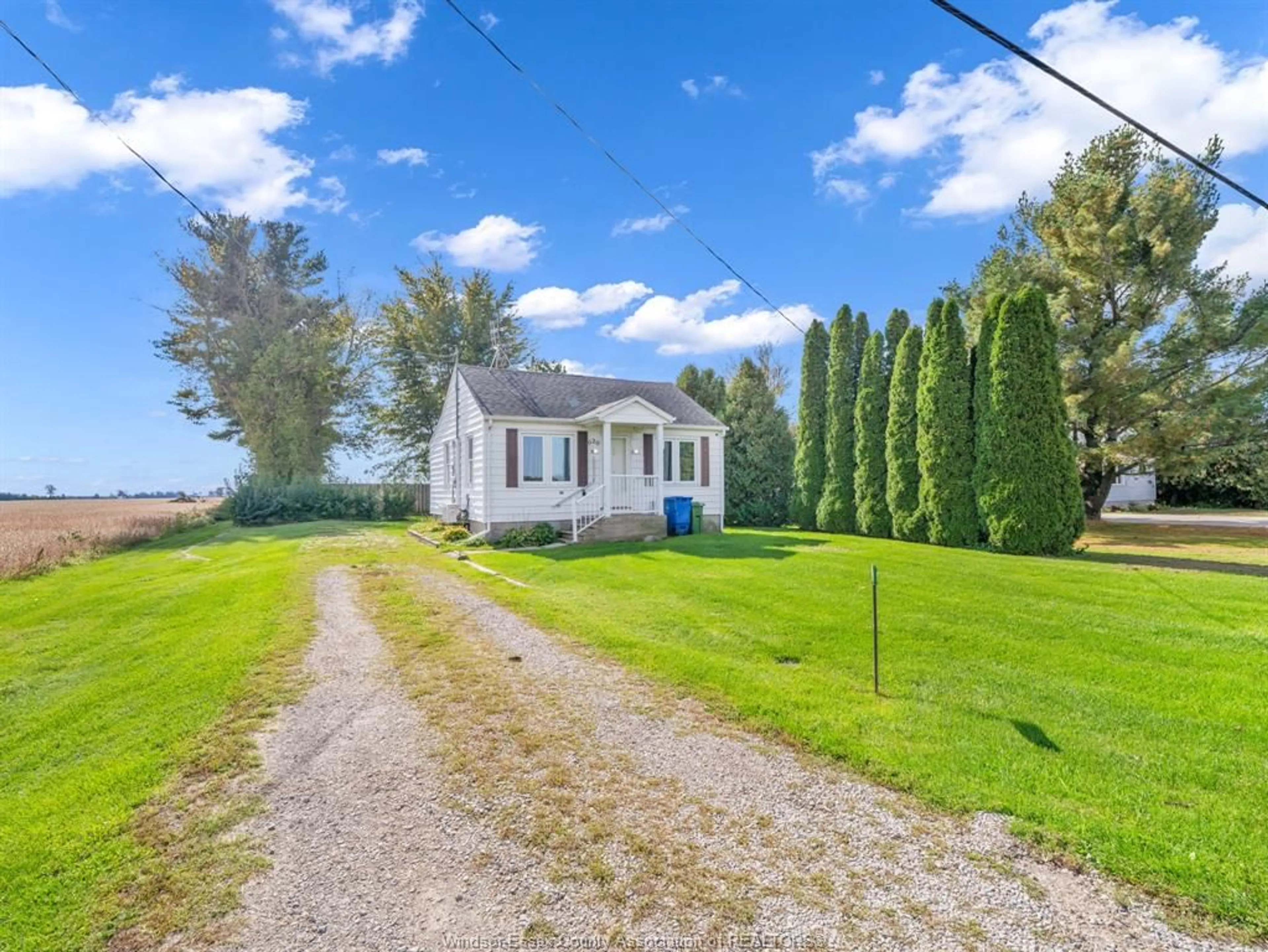 A pic from outside/outdoor area/front of a property/back of a property/a pic from drone, water/lake/river/ocean view for 920 MERSEA RD 6, Leamington Ontario N8H 3V6