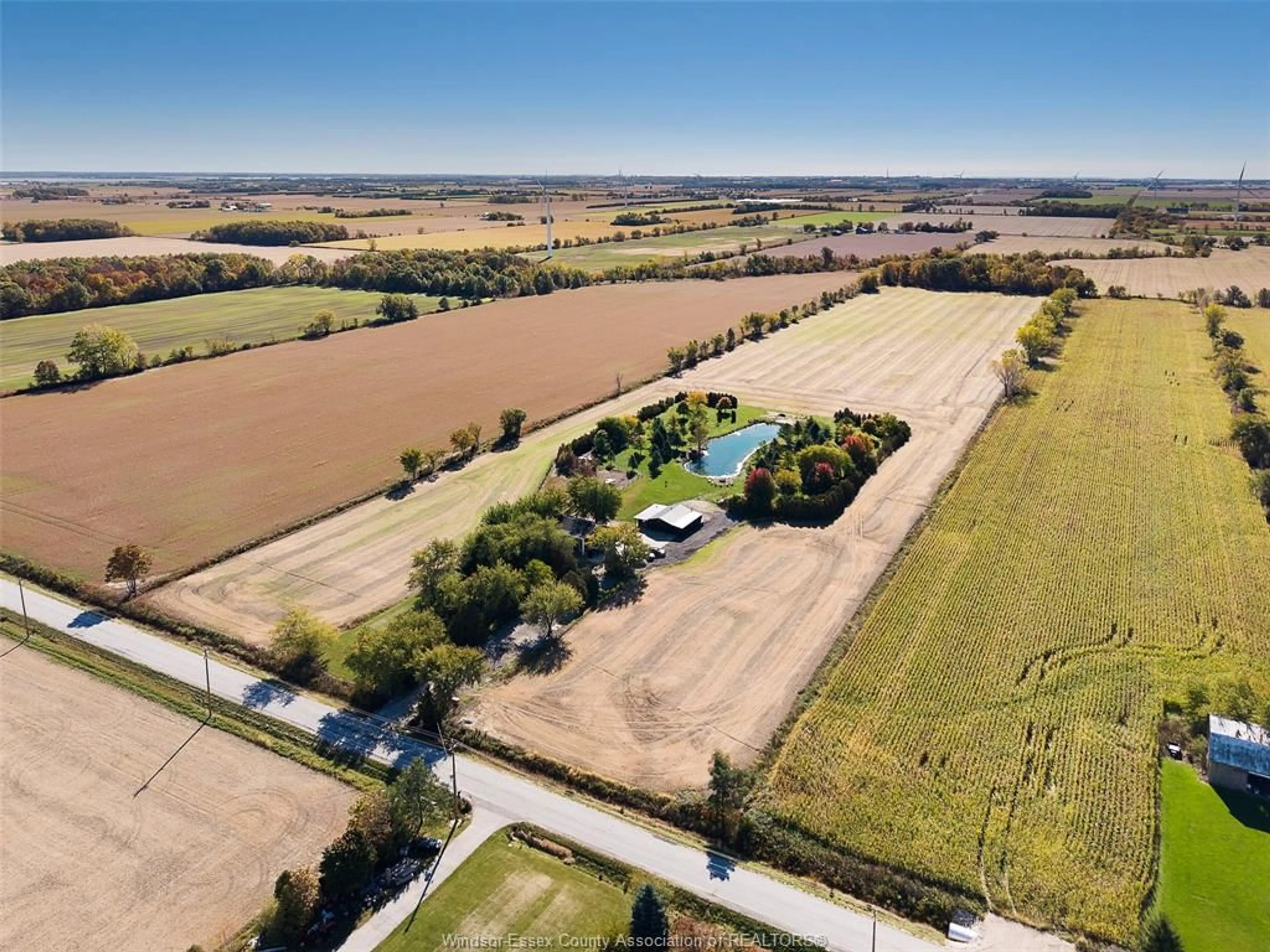 A pic from outside/outdoor area/front of a property/back of a property/a pic from drone, street for 530 ROAD 11, Kingsville Ontario N0R 1V0