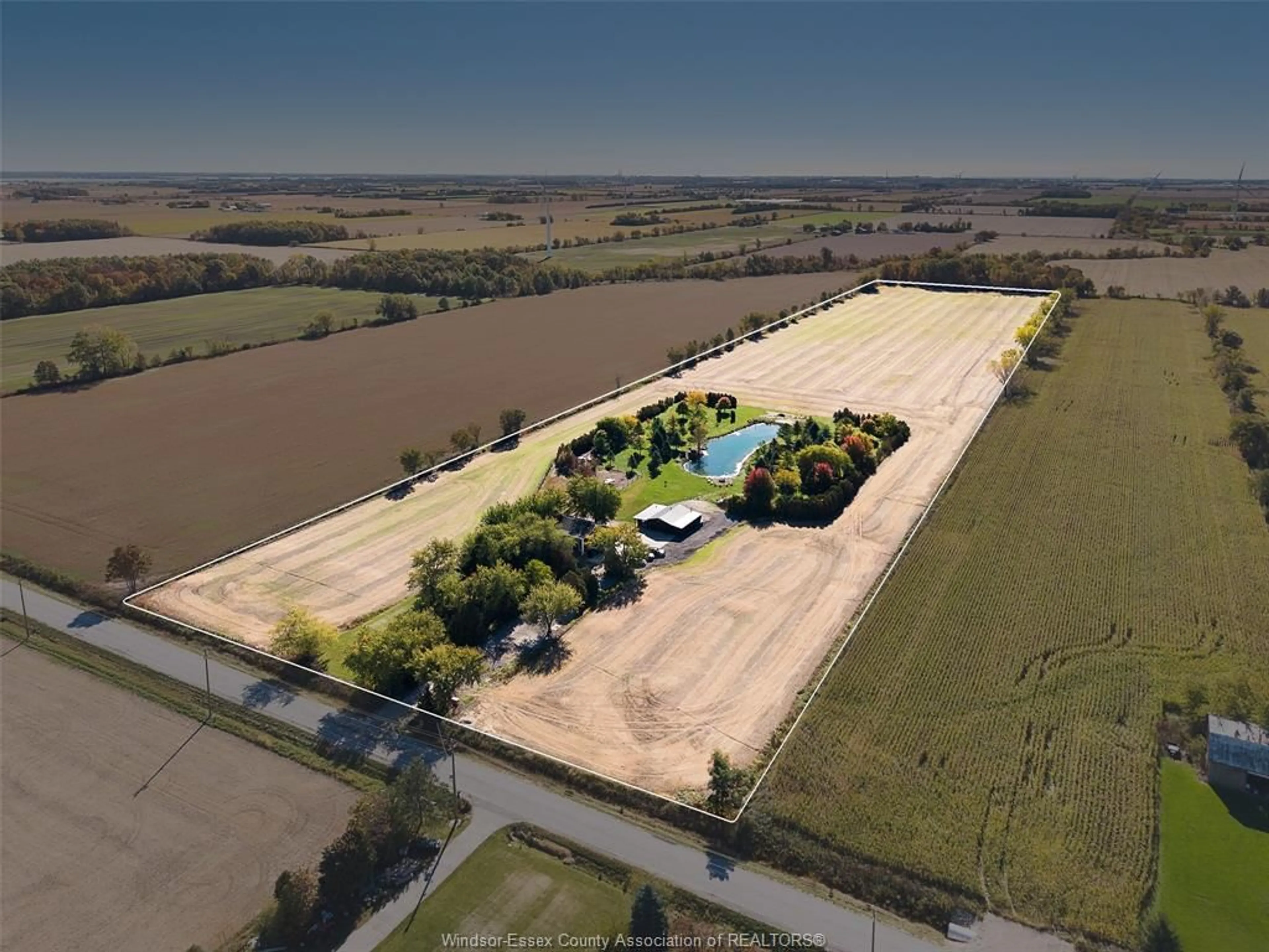 A pic from outside/outdoor area/front of a property/back of a property/a pic from drone, unknown for 530 ROAD 11, Kingsville Ontario N0R 1V0