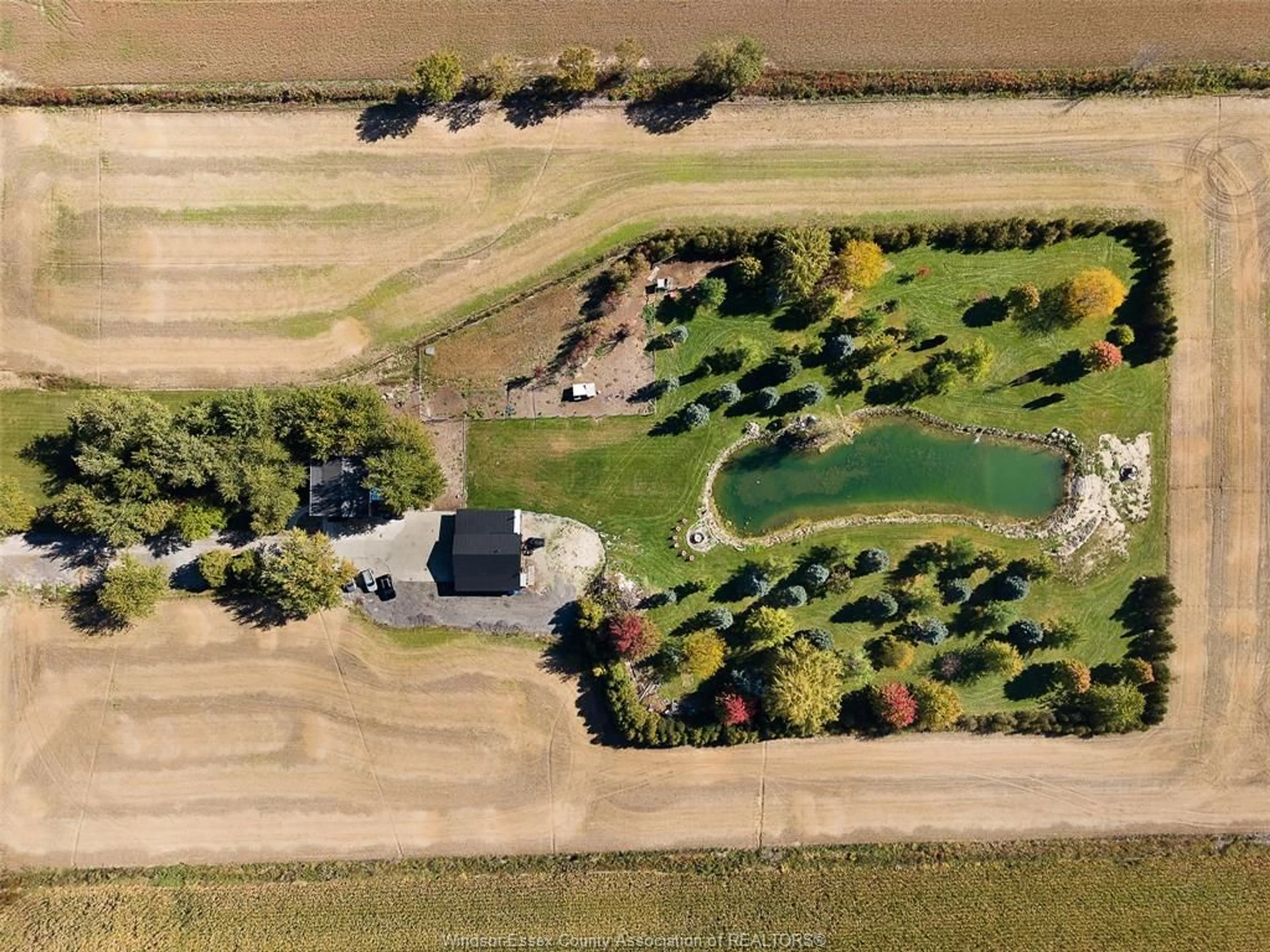 A pic from outside/outdoor area/front of a property/back of a property/a pic from drone, street for 530 ROAD 11, Kingsville Ontario N0R 1V0