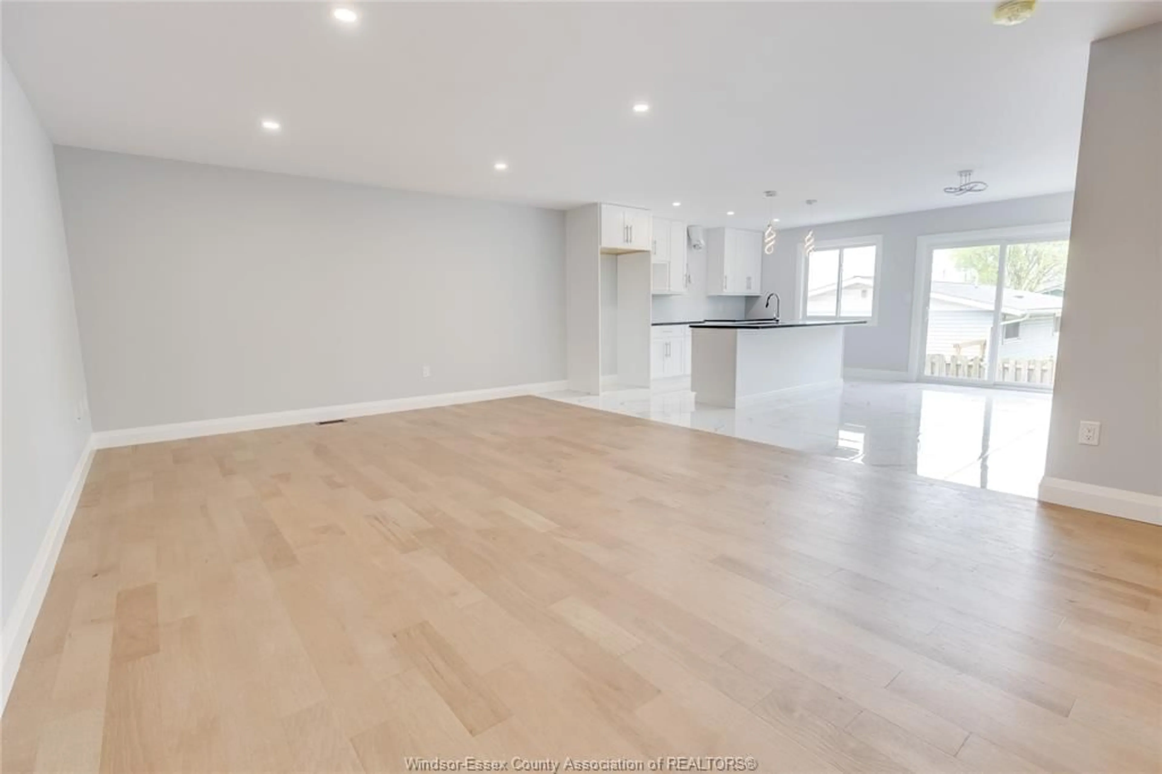 Open concept kitchen, wood/laminate floor for 120 ANGELO Ave, LaSalle Ontario N9J 0E5