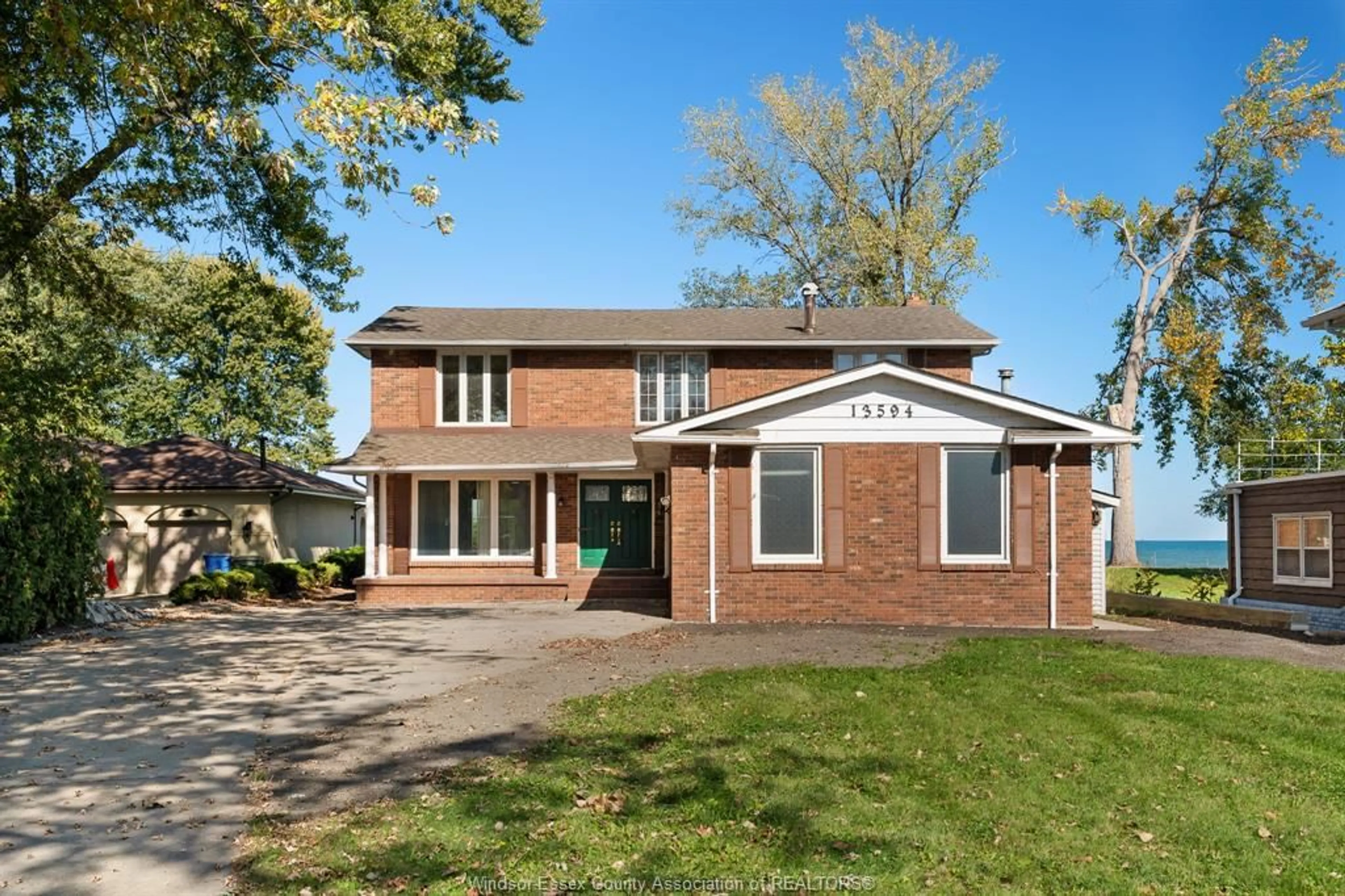 Home with brick exterior material, street for 13594 RIVERSIDE Dr, Tecumseh Ontario N8N 2M8