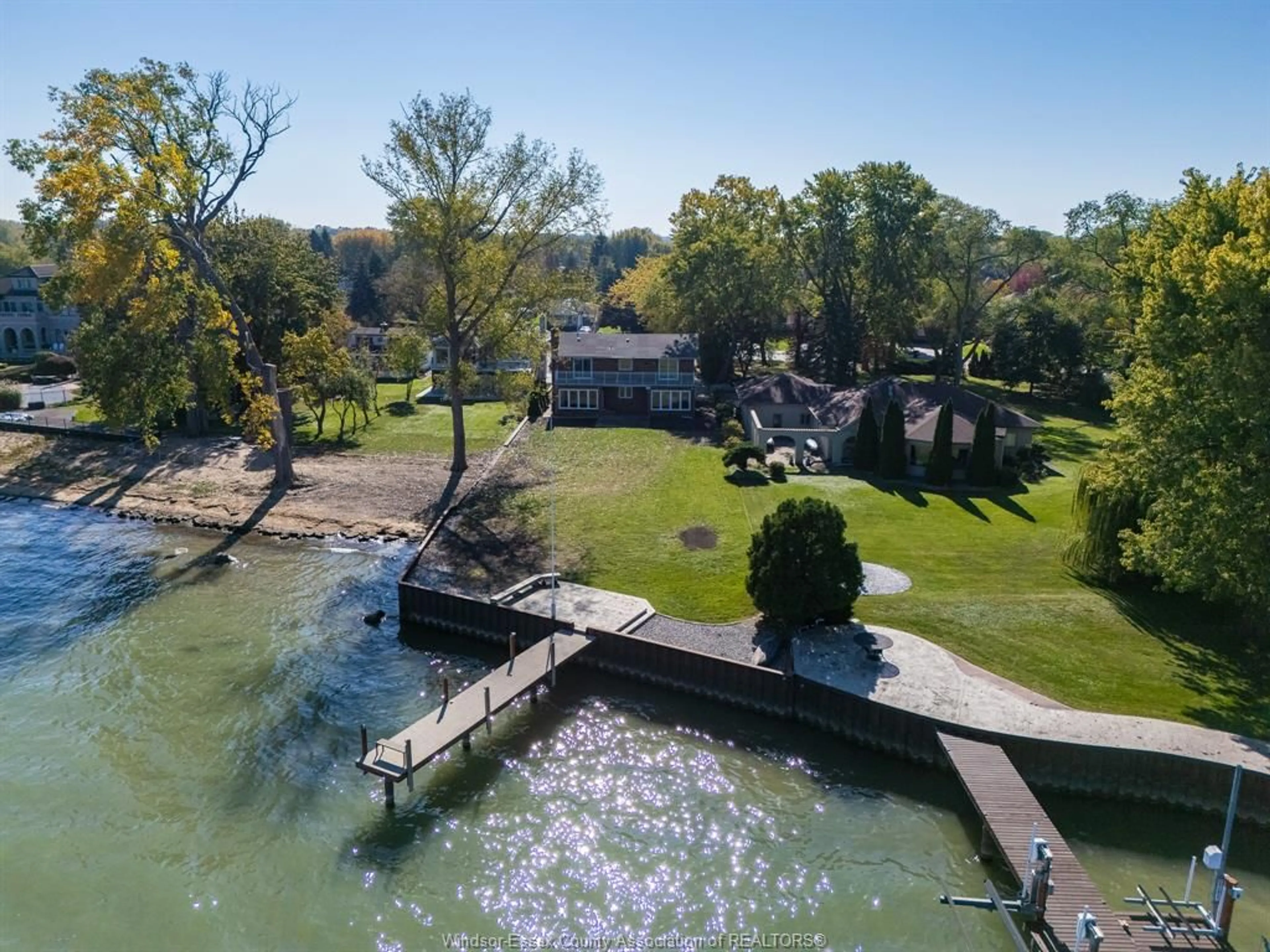 A pic from outside/outdoor area/front of a property/back of a property/a pic from drone, water/lake/river/ocean view for 13594 RIVERSIDE Dr, Tecumseh Ontario N8N 2M8