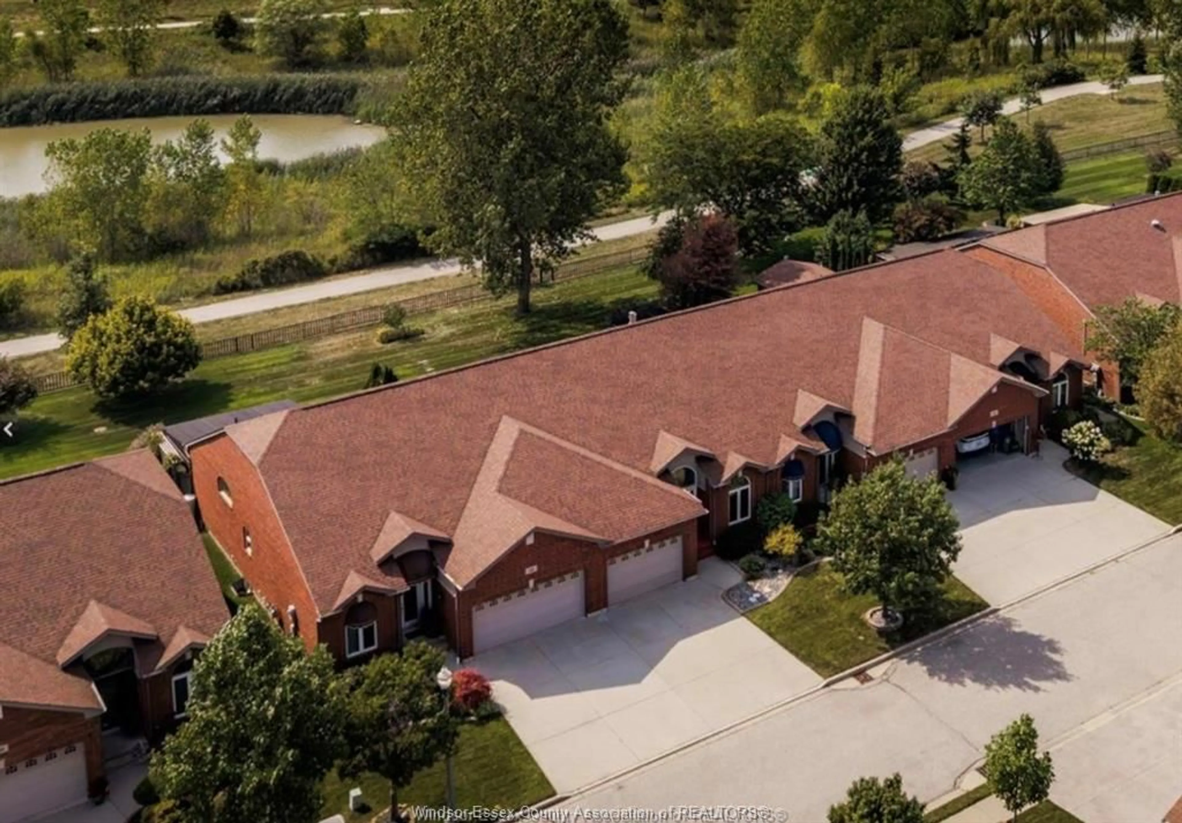 A pic from outside/outdoor area/front of a property/back of a property/a pic from drone, street for 1519 Aspenshore Ave, Windsor Ontario N8P 1Y4