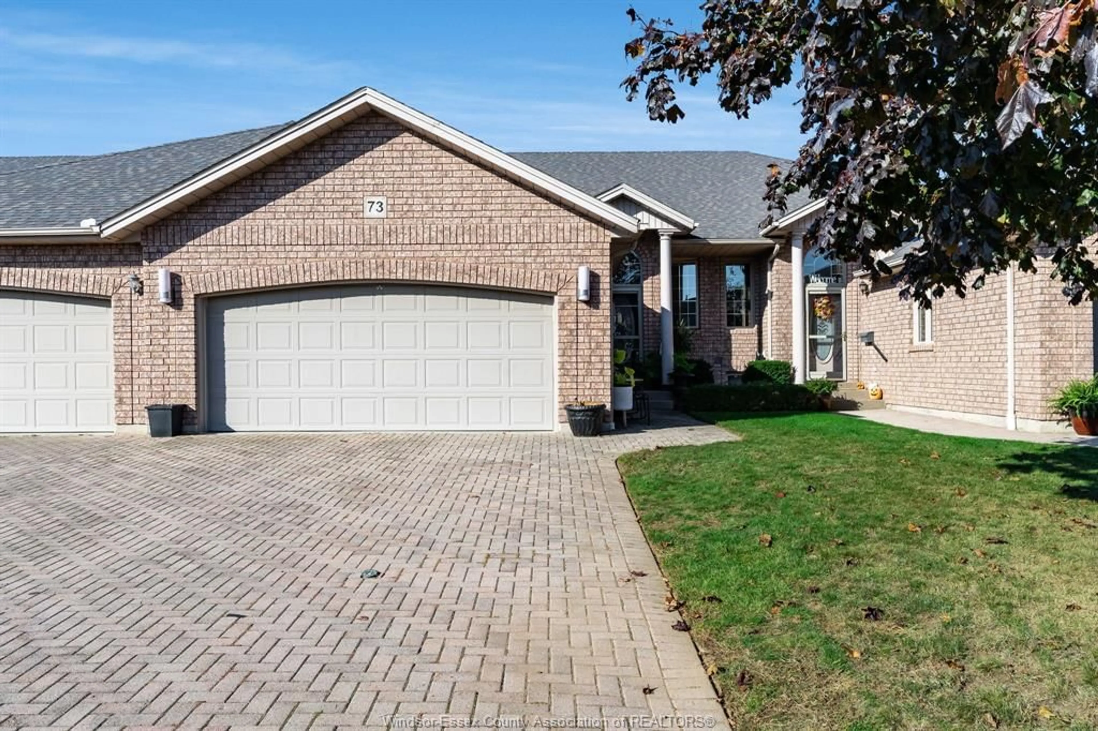 Home with brick exterior material, street for 73 Theresa Trail, Leamington Ontario N8H 5M8