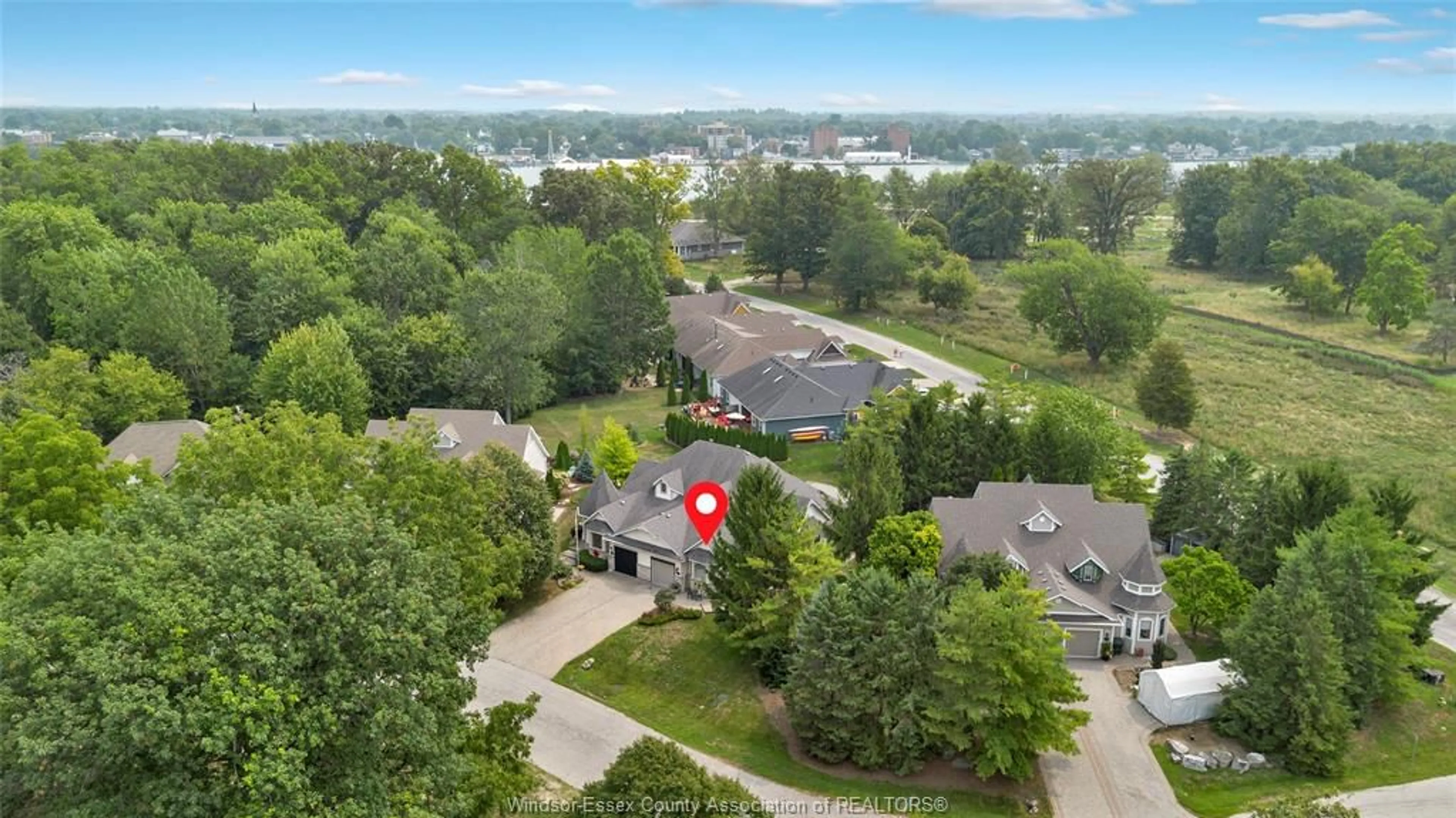 A pic from outside/outdoor area/front of a property/back of a property/a pic from drone, unknown for 227 CRYSTAL BAY Dr, Amherstburg Ontario N9V 4A6