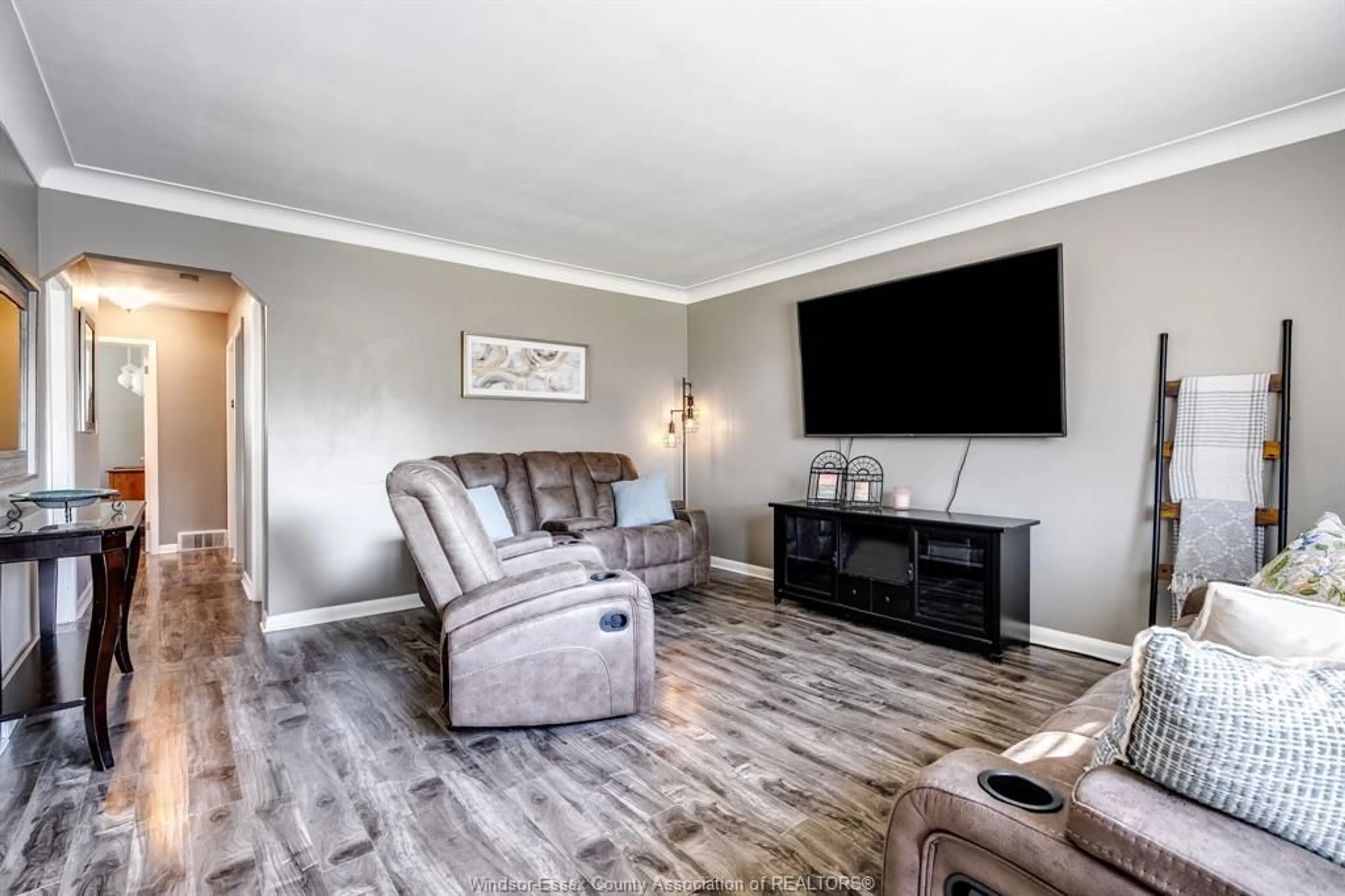 Living room with furniture, wood/laminate floor for 373 Superior, LaSalle Ontario N9J 1H7