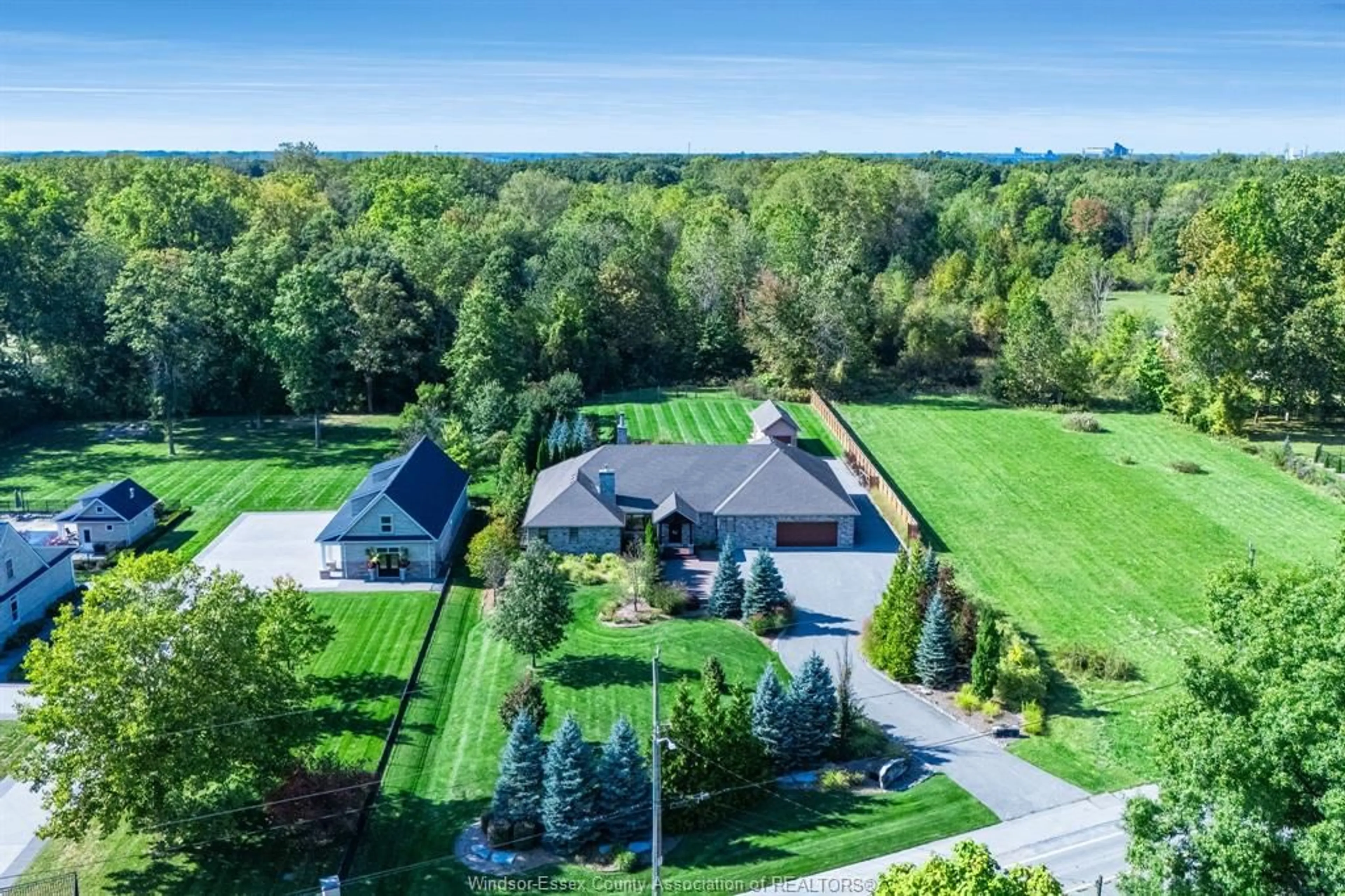 A pic from outside/outdoor area/front of a property/back of a property/a pic from drone, unknown for 7255 Matchett Rd, LaSalle Ontario N9J 2S2