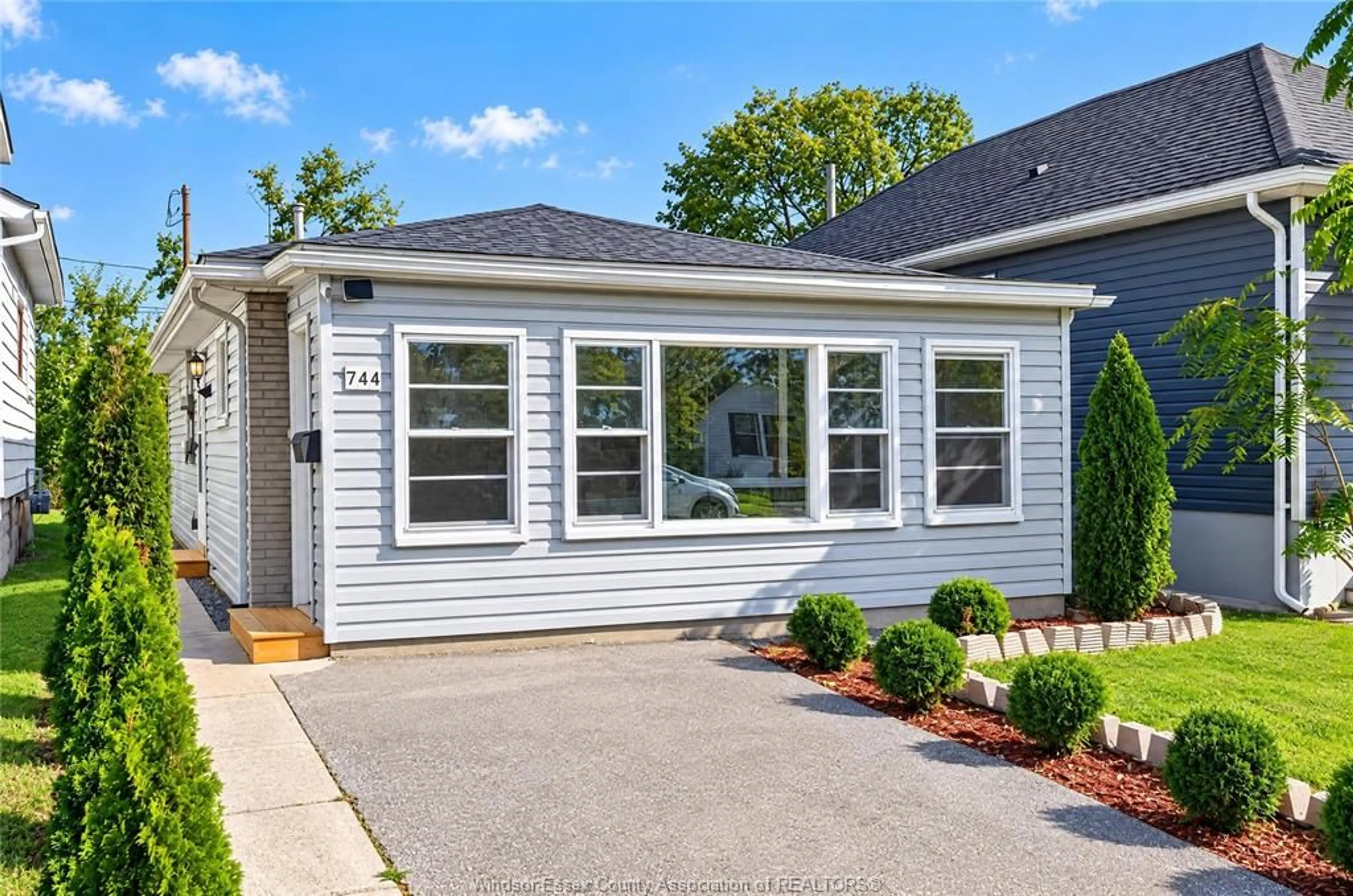 Home with vinyl exterior material, street for 744 Mckay Avenue, Windsor Ontario N9B 2A1