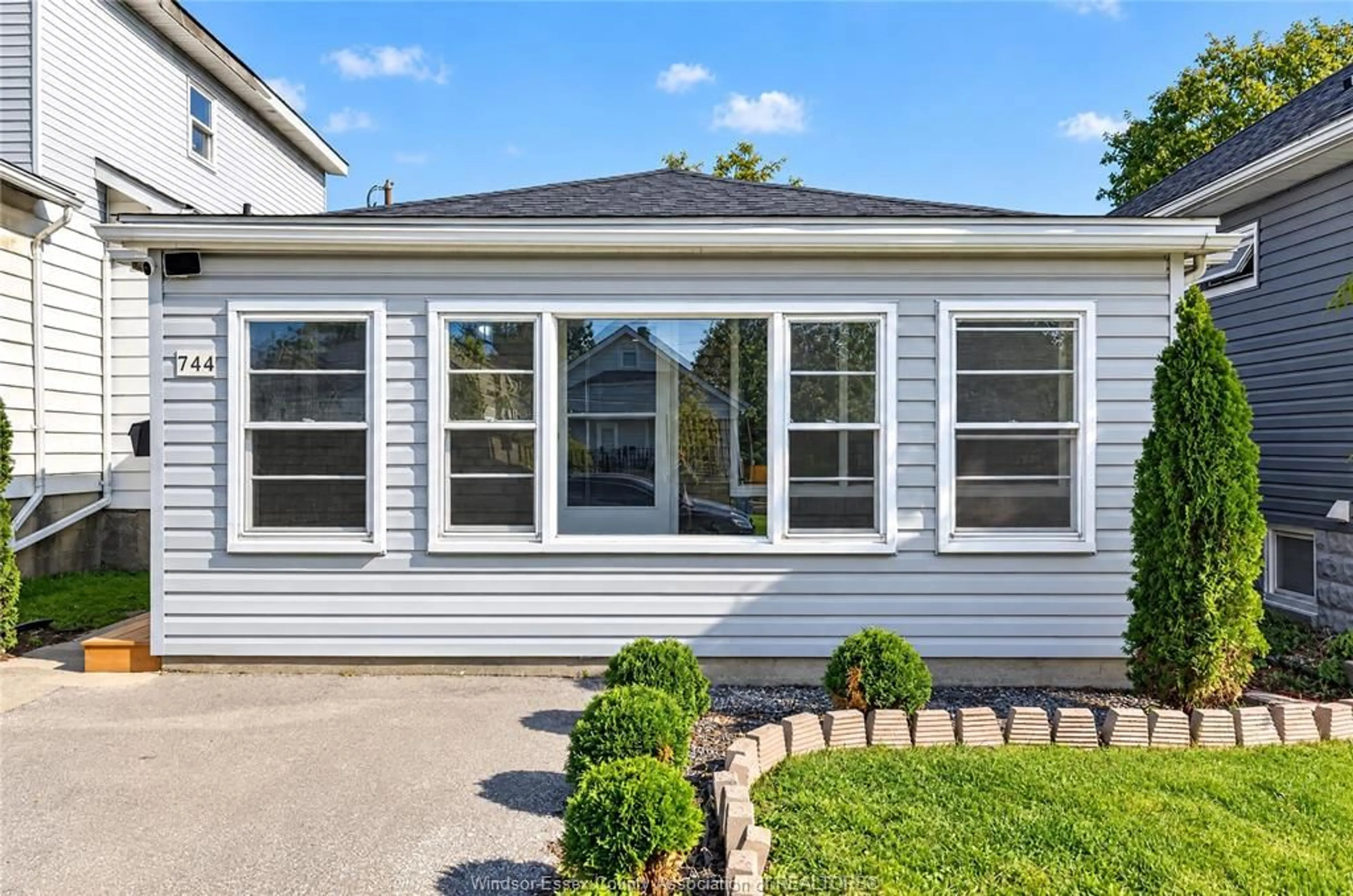 Home with vinyl exterior material, street for 744 Mckay Avenue, Windsor Ontario N9B 2A1
