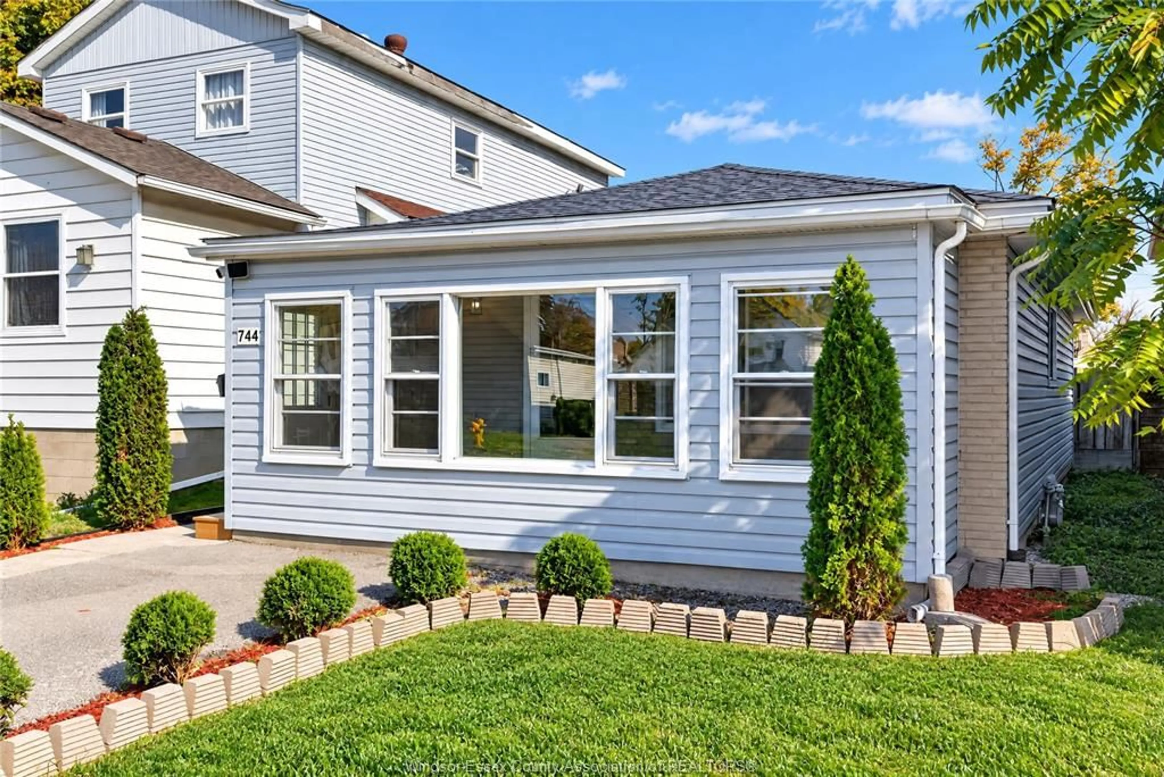 Home with vinyl exterior material, street for 744 Mckay Avenue, Windsor Ontario N9B 2A1