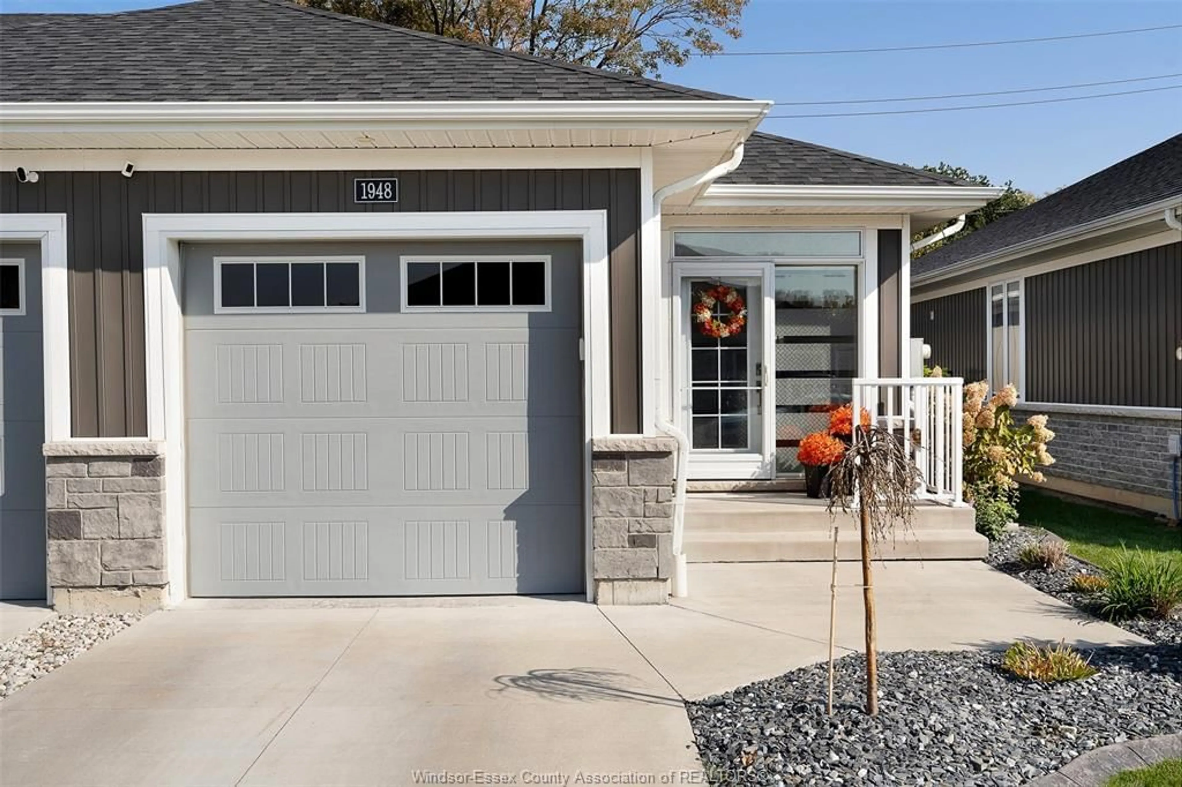 Home with vinyl exterior material, street for 1948 ETHAN COURT, Windsor Ontario N8T 0B3