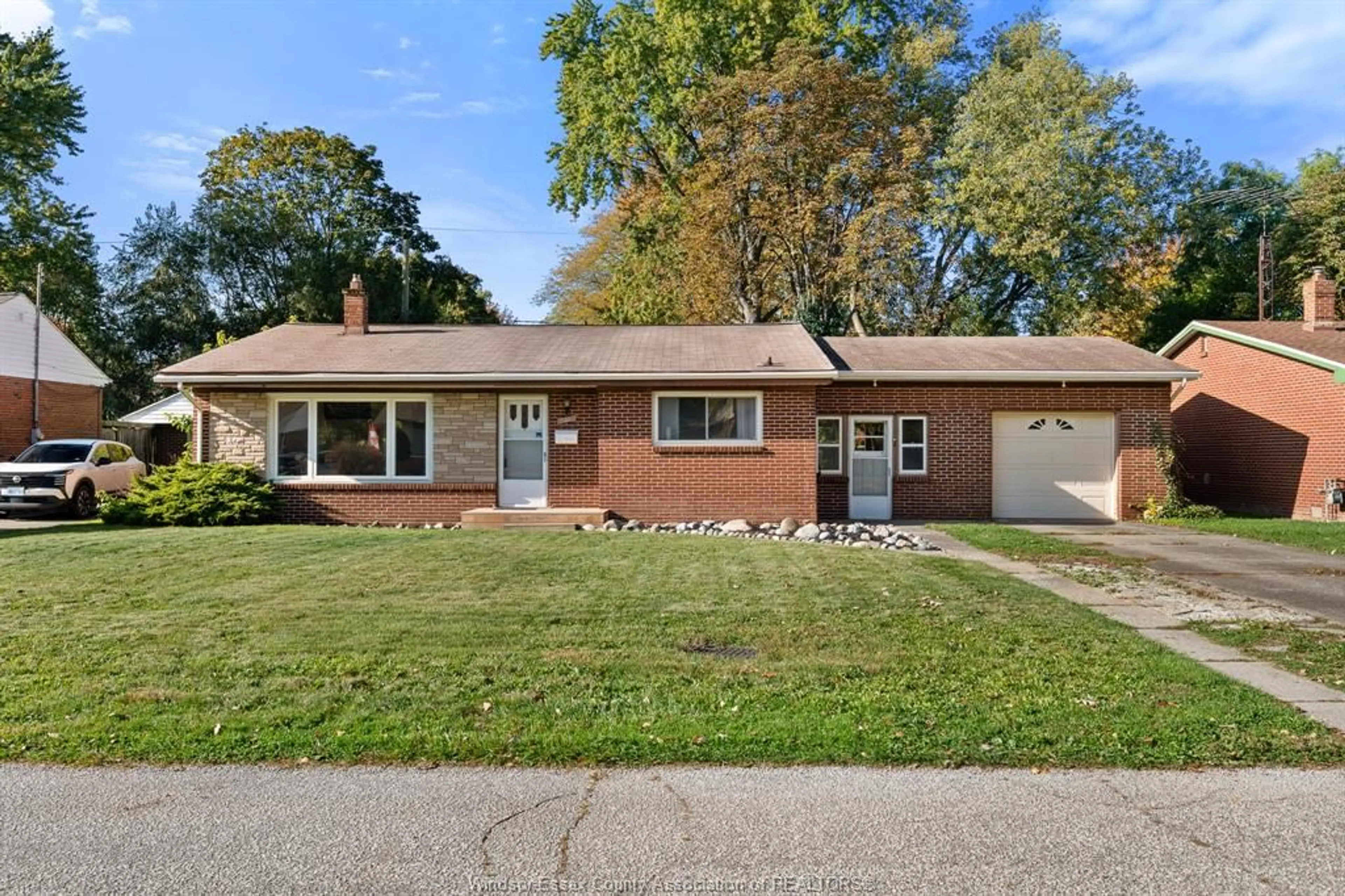 Home with brick exterior material, street for 3221 VIRGINIA Pk, Windsor Ontario N9E 2C4