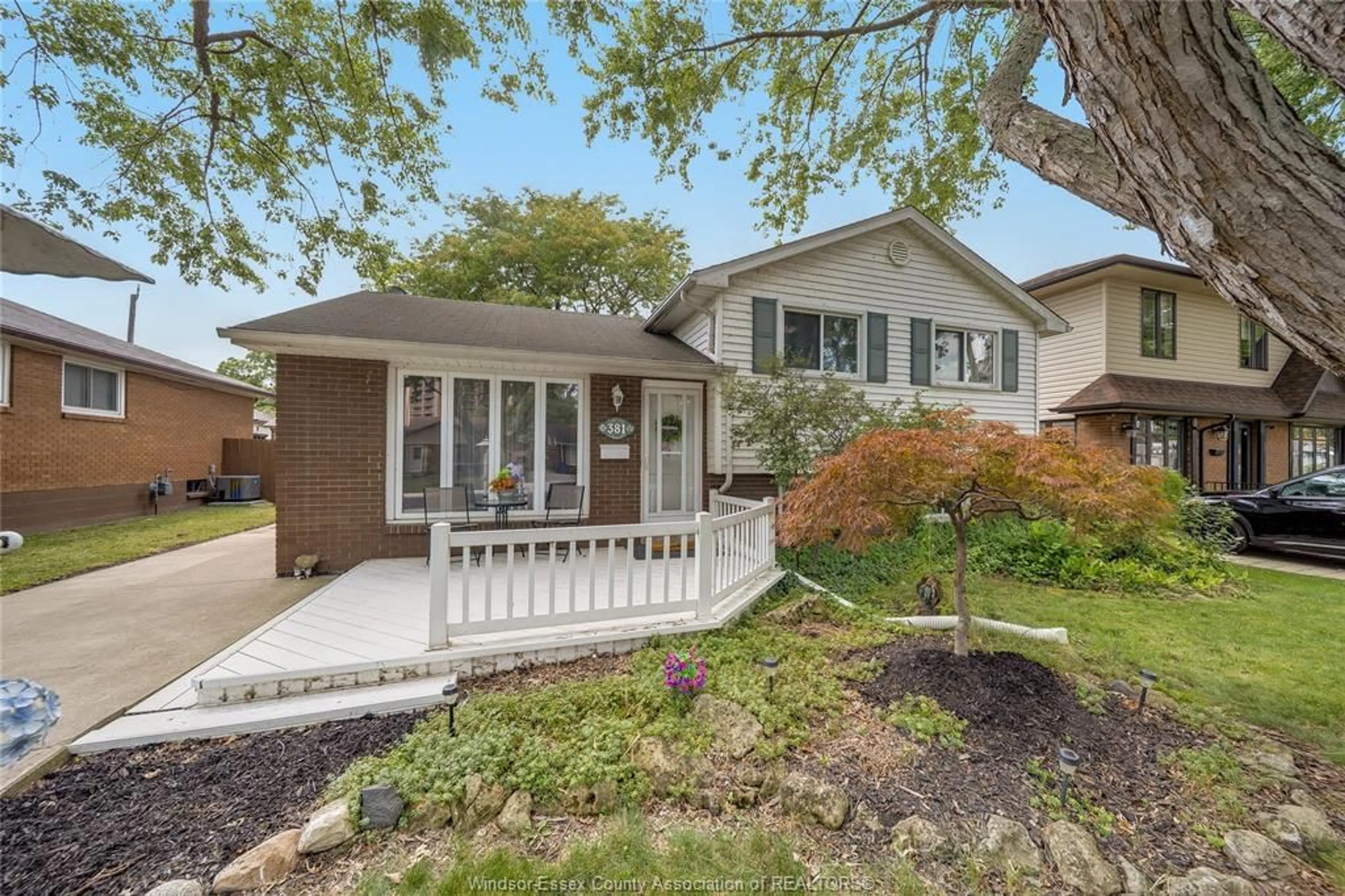 Home with vinyl exterior material, street for 381 CARLING, Windsor Ontario N8S 3X7