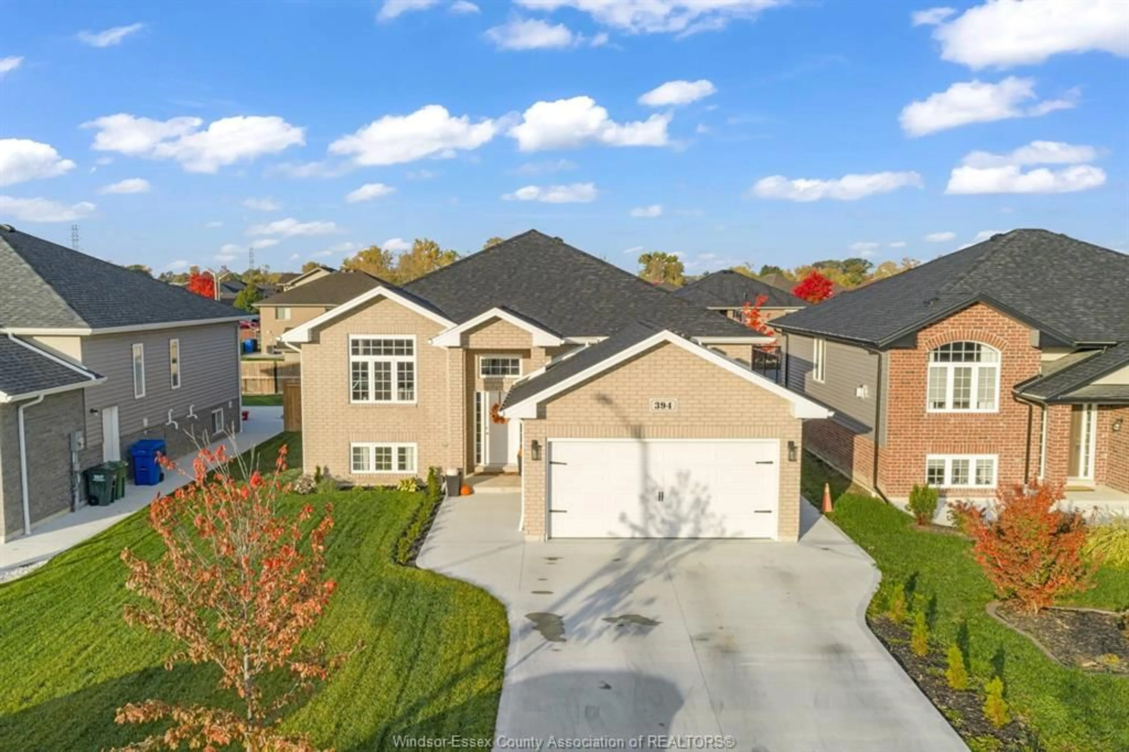 A pic from outside/outdoor area/front of a property/back of a property/a pic from drone, street for 394 Cypress Lane, Lakeshore Ontario N8L 1A8