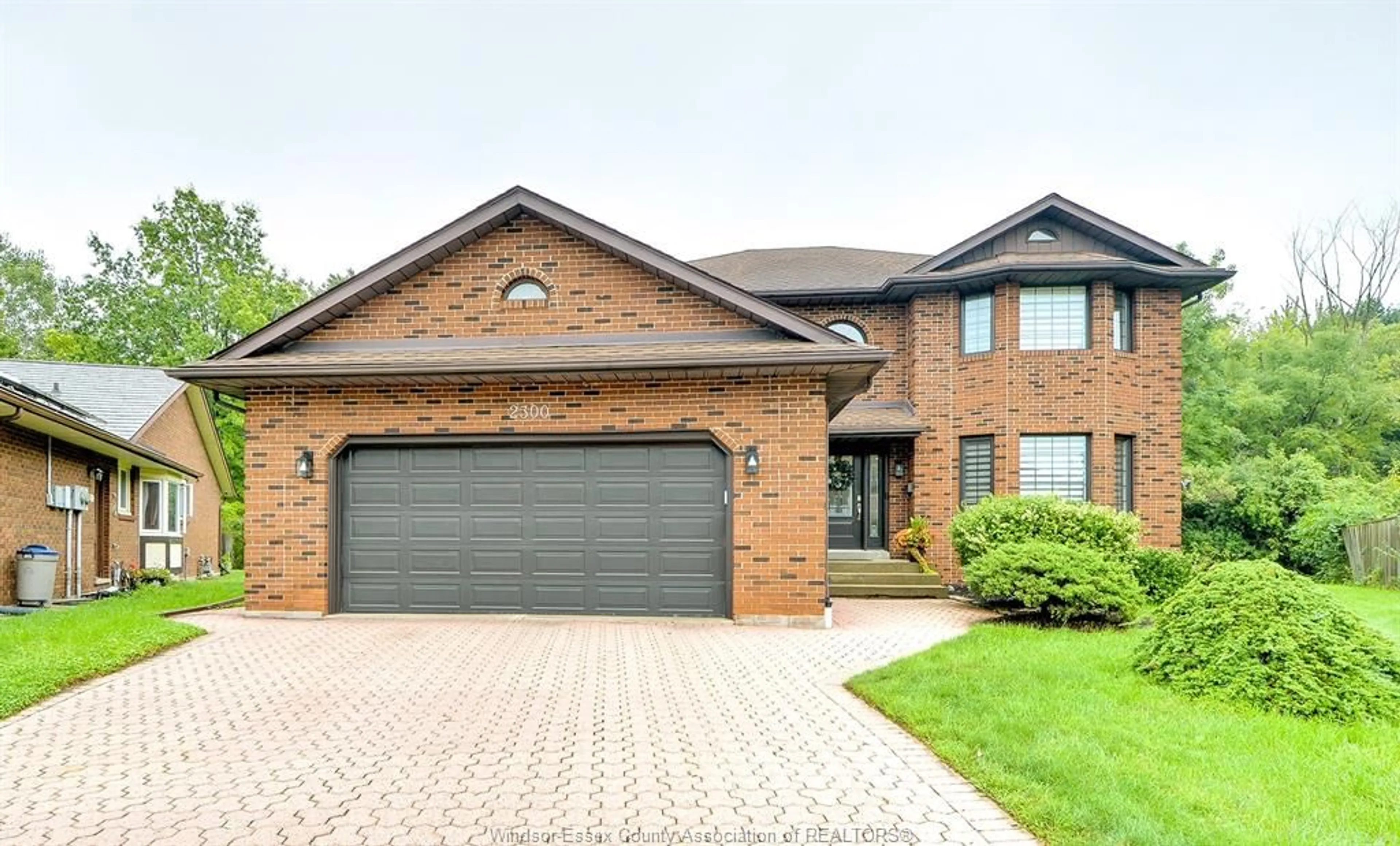Home with brick exterior material, street for 2300 Santo Dr, Windsor Ontario N9G 2J8