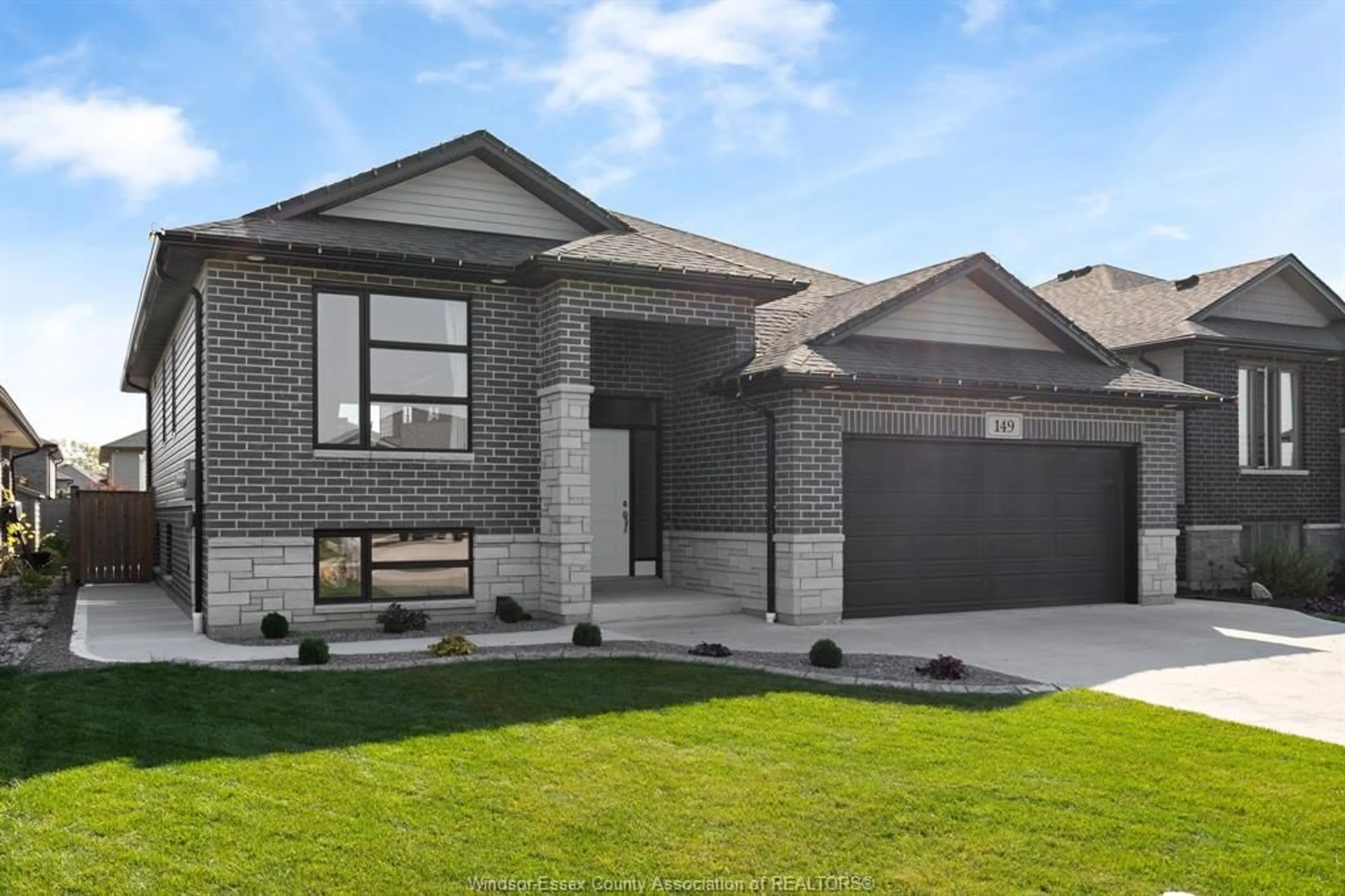 Home with brick exterior material, street for 149 TOWNSVIEW Crt, Essex Ontario N8M 0A4