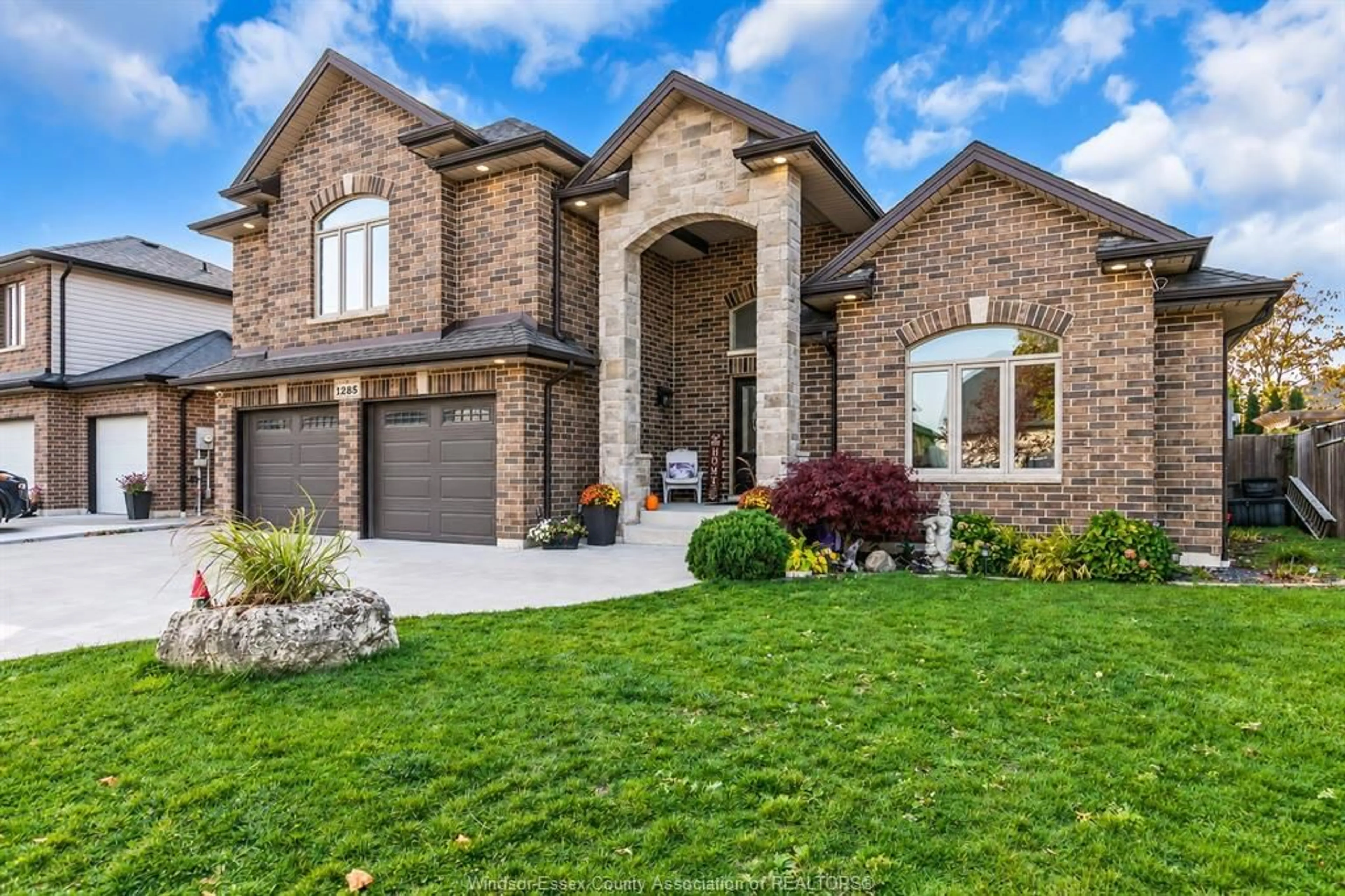 Home with brick exterior material, street for 1285 DEER RUN Trail, Lakeshore Ontario N8L 0S8