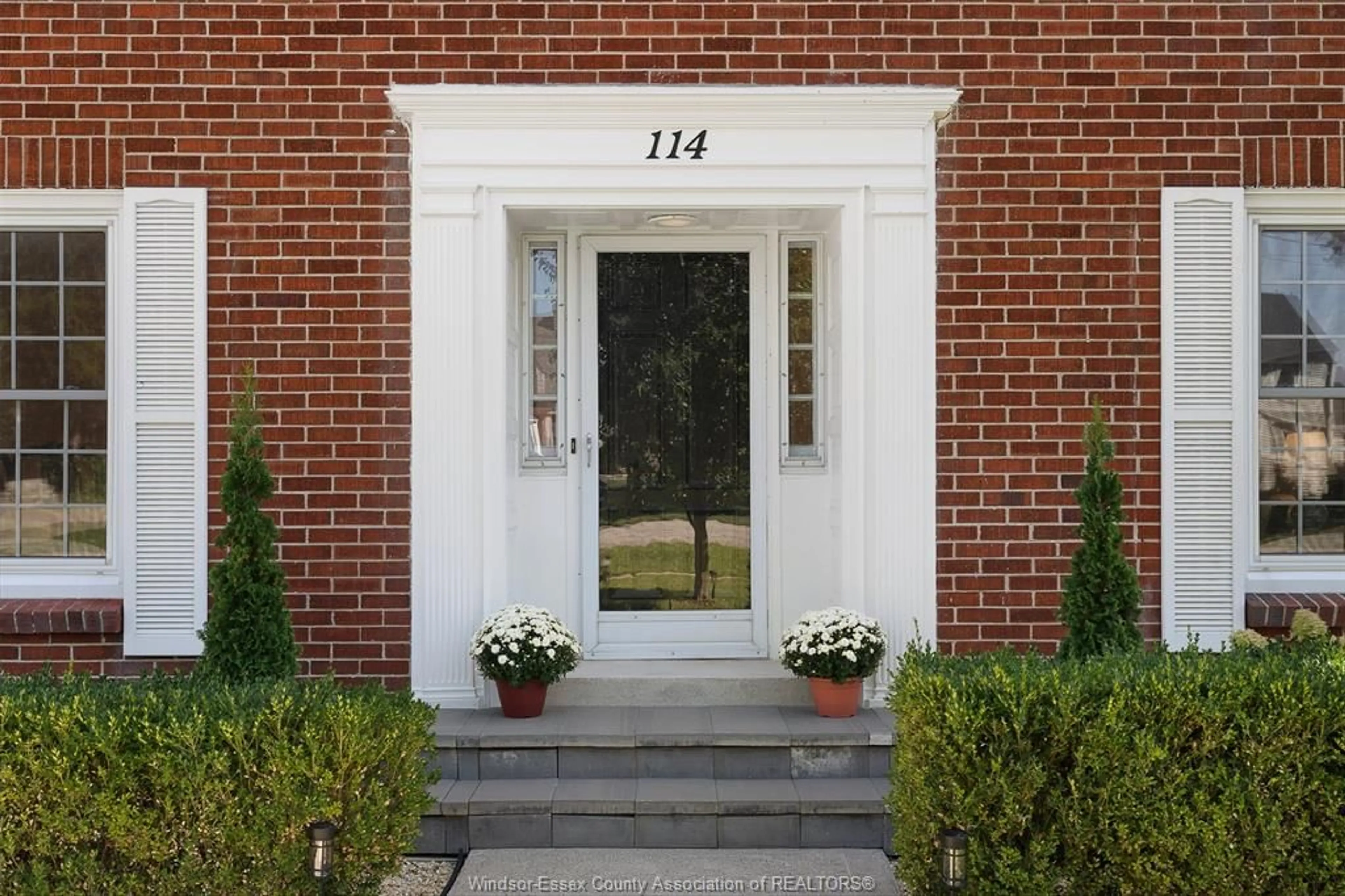 Home with brick exterior material, street for 114 WALNUT St, Harrow Ontario N0R 1G0