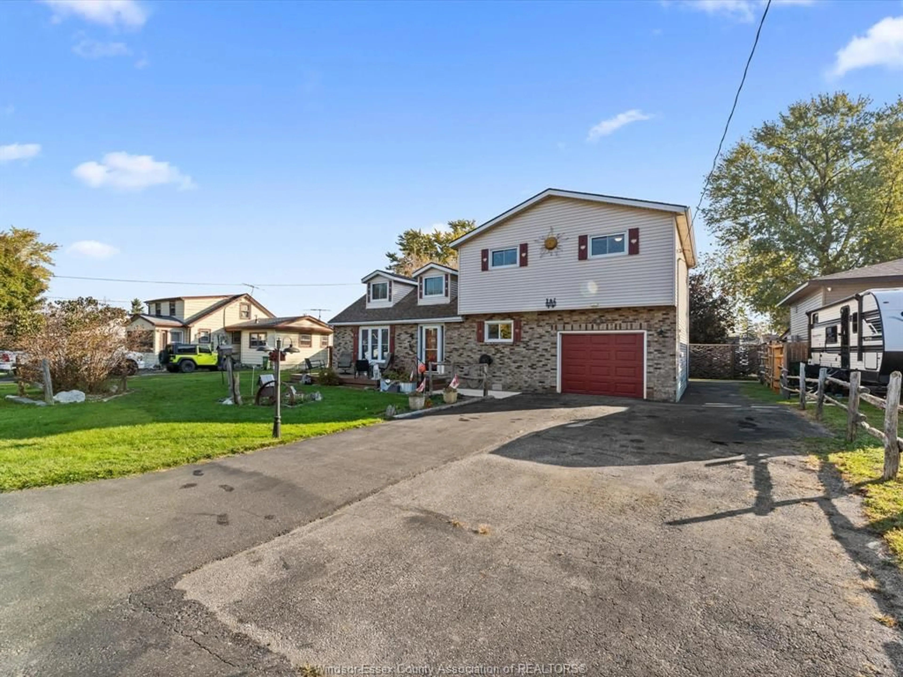 A pic from outside/outdoor area/front of a property/back of a property/a pic from drone, street for 220 CARUHEL Dr, Emeryville Ontario N0R 1C0
