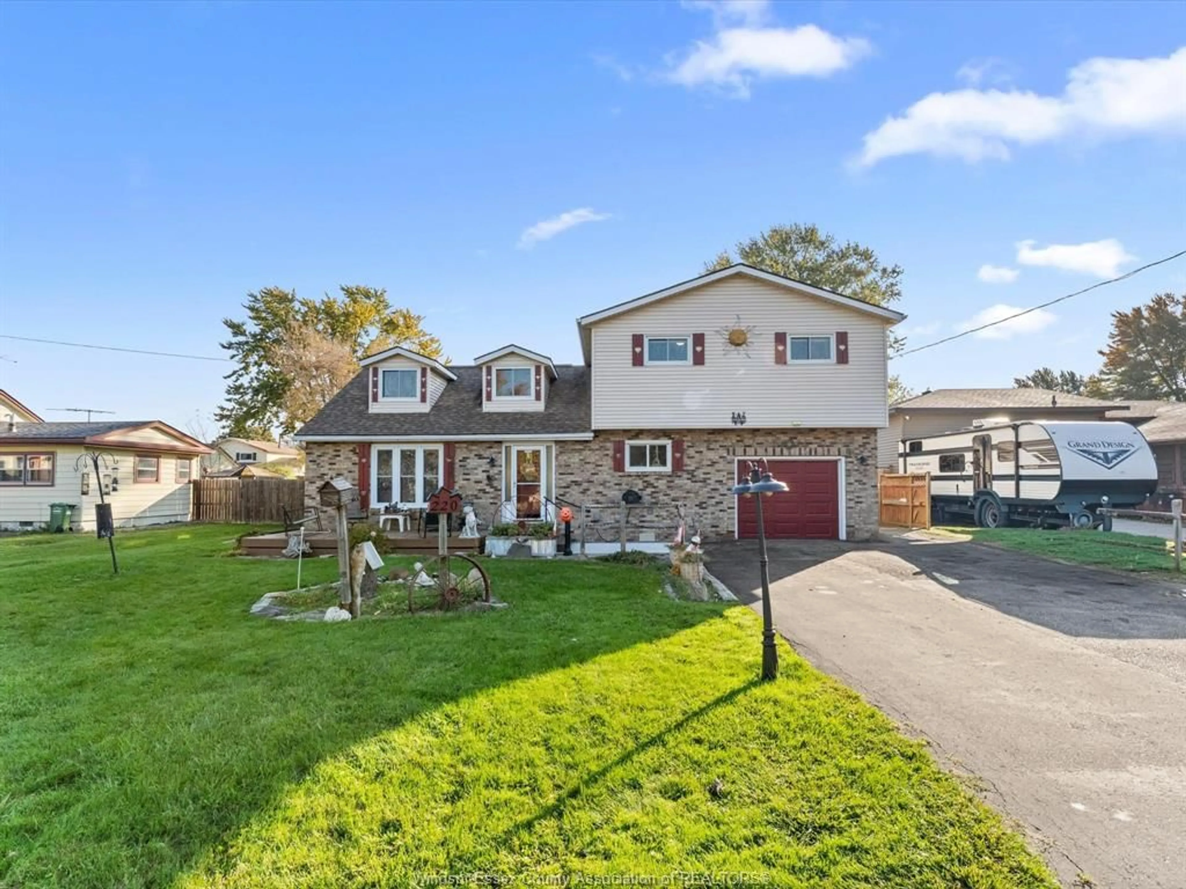 A pic from outside/outdoor area/front of a property/back of a property/a pic from drone, street for 220 CARUHEL Dr, Emeryville Ontario N0R 1C0